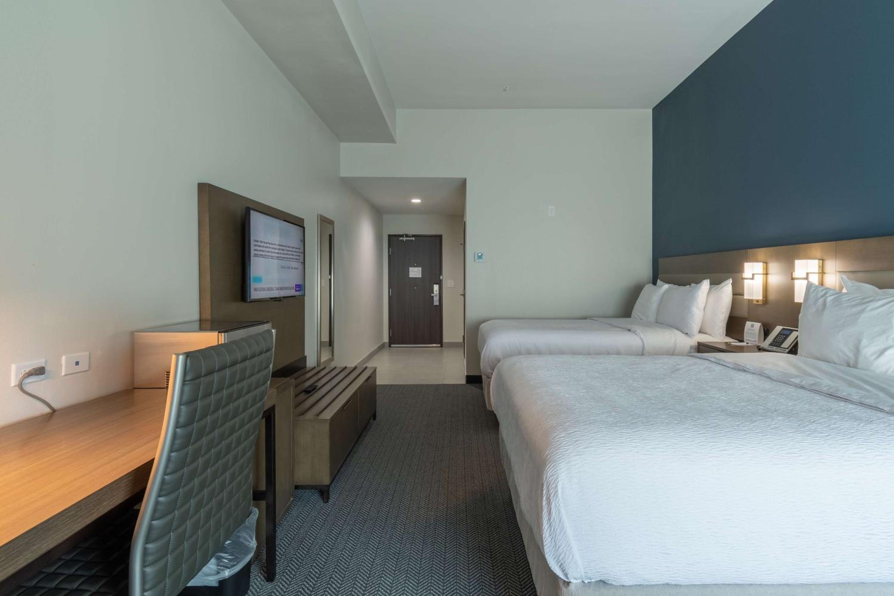 Queen Room with Two Queen Beds - Shower Only - Photo 2
