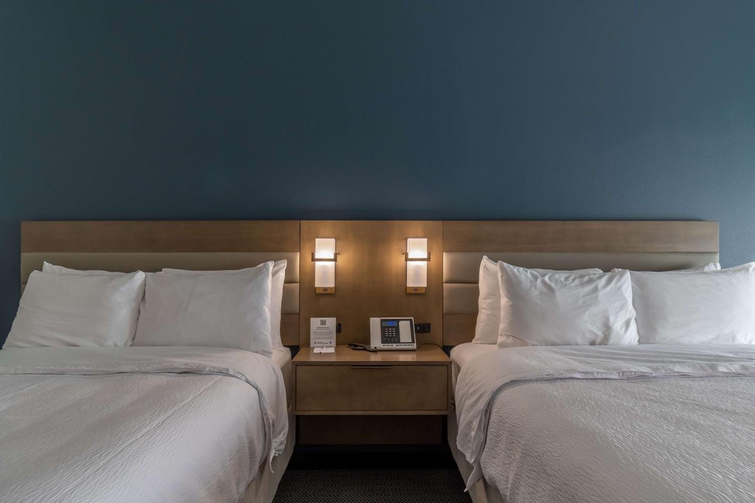 Queen Room with Two Queen Beds - Shower Only - Photo 1