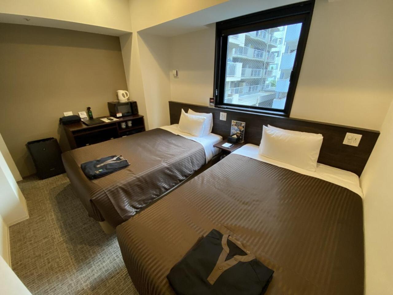 Twin Room - Non-Smoking - Photo 3