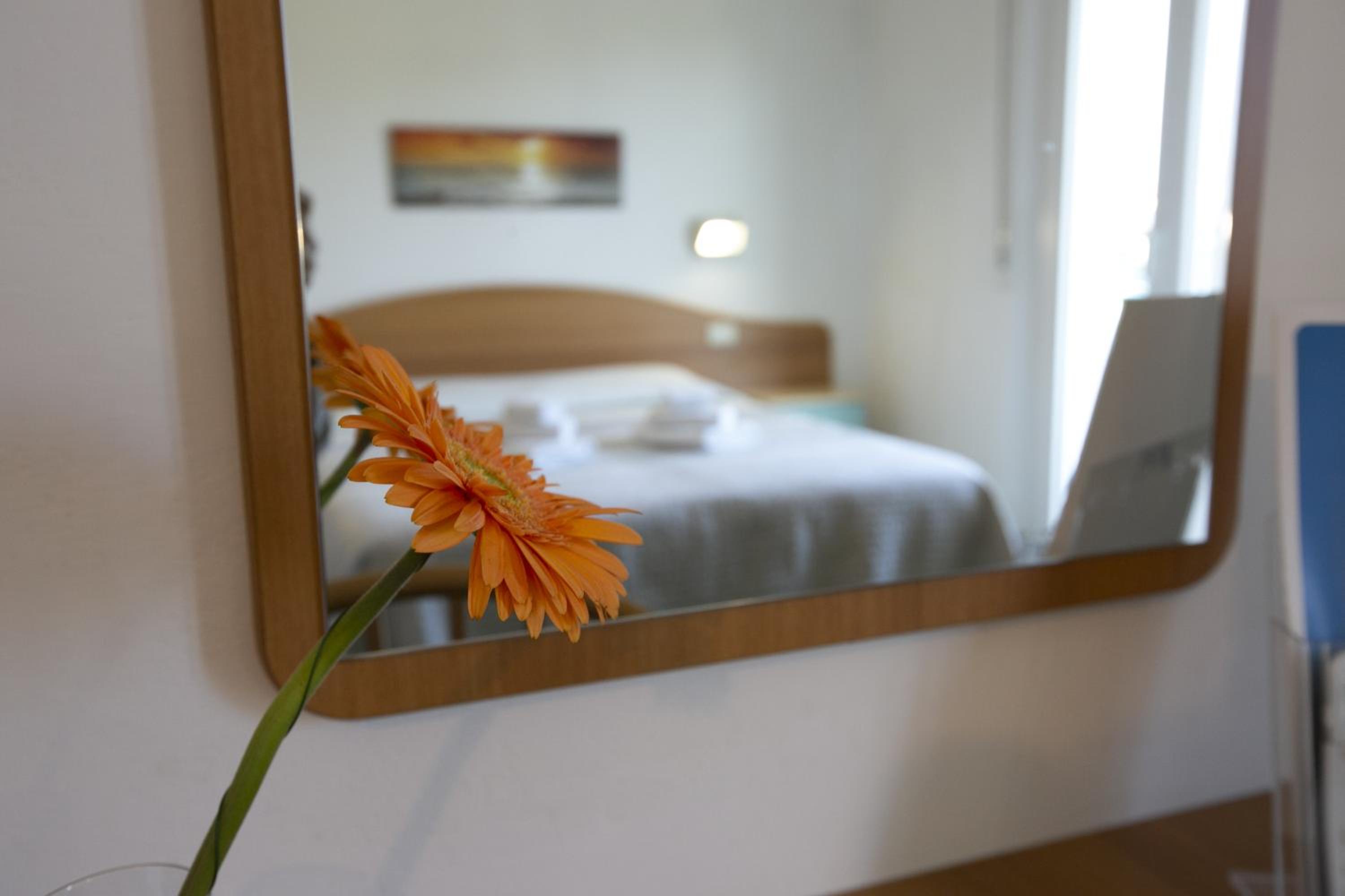 Quadruple Room with Balcony - Photo 1