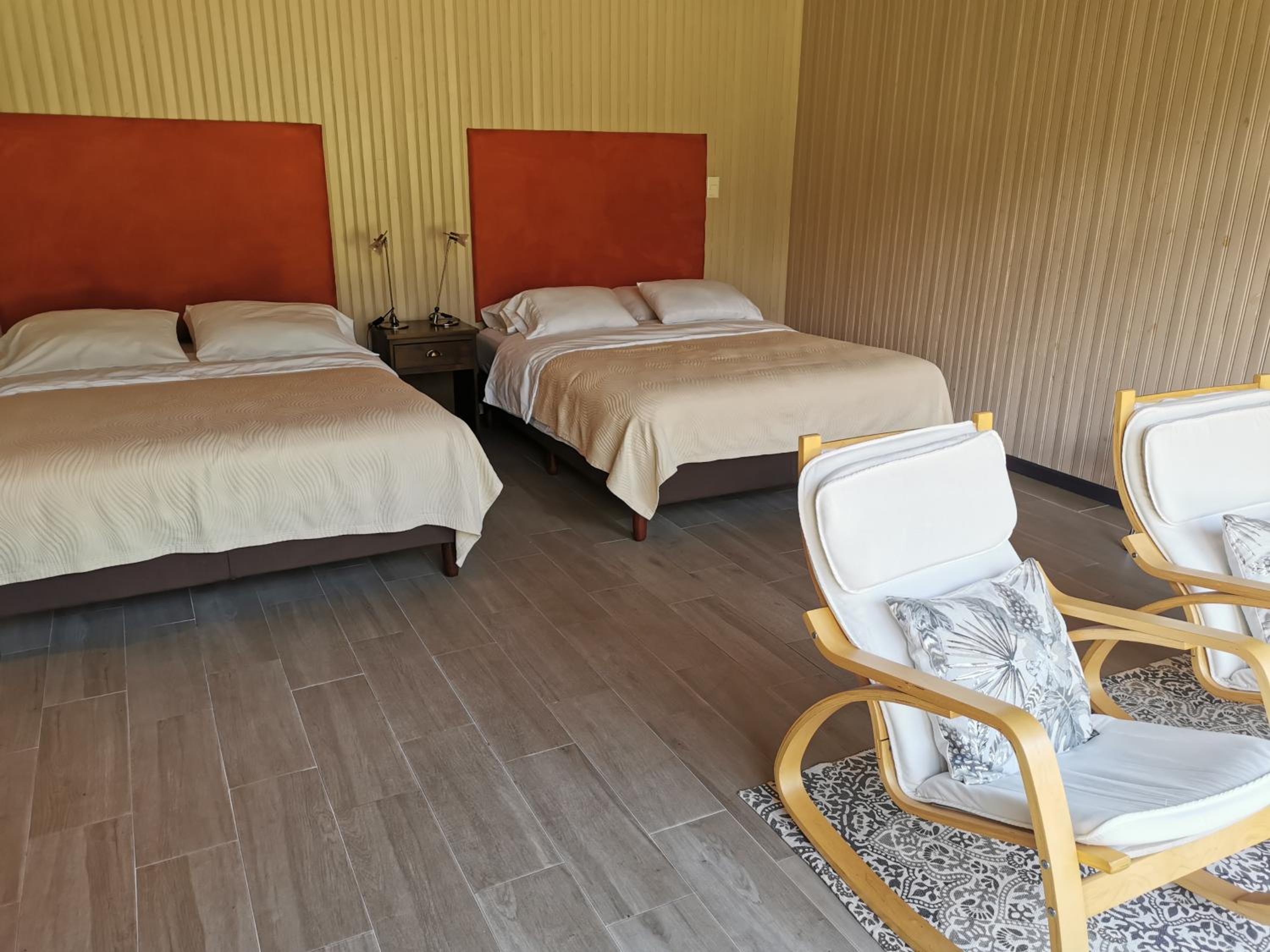 Deluxe Queen Room with Two Queen Beds photo 1