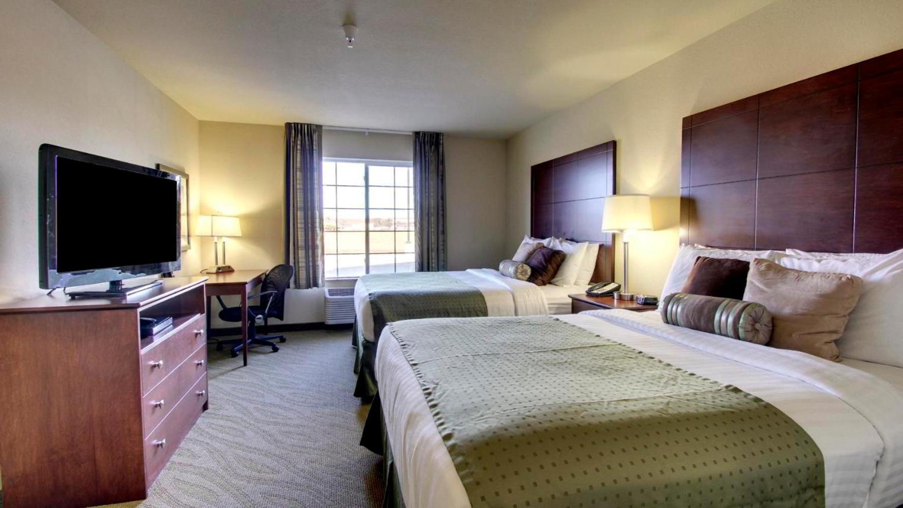 Queen Room with Two Queen Beds - Photo 1