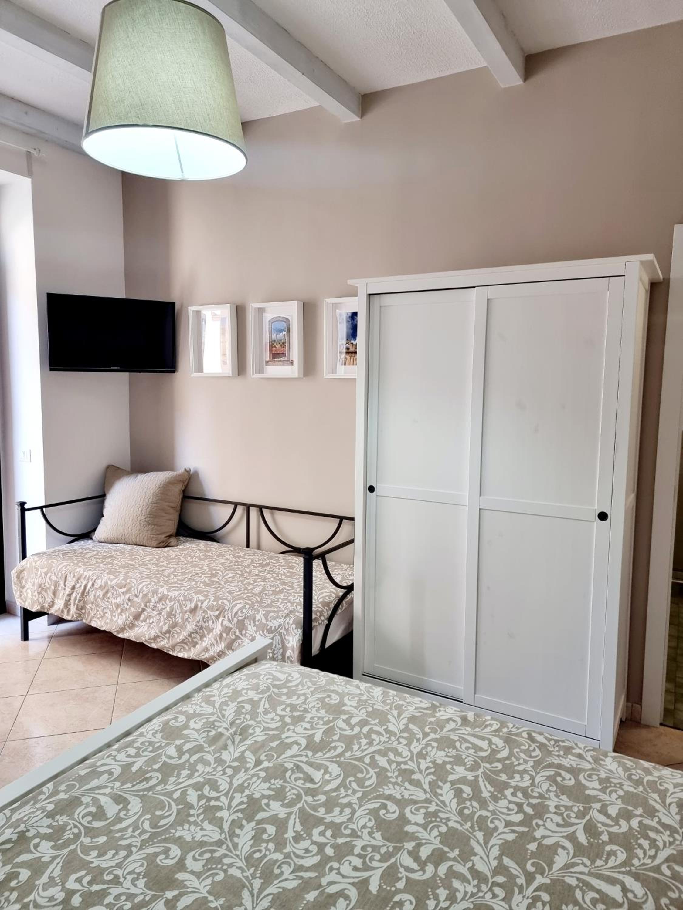 Triple Room with Private Bathroom photo 3