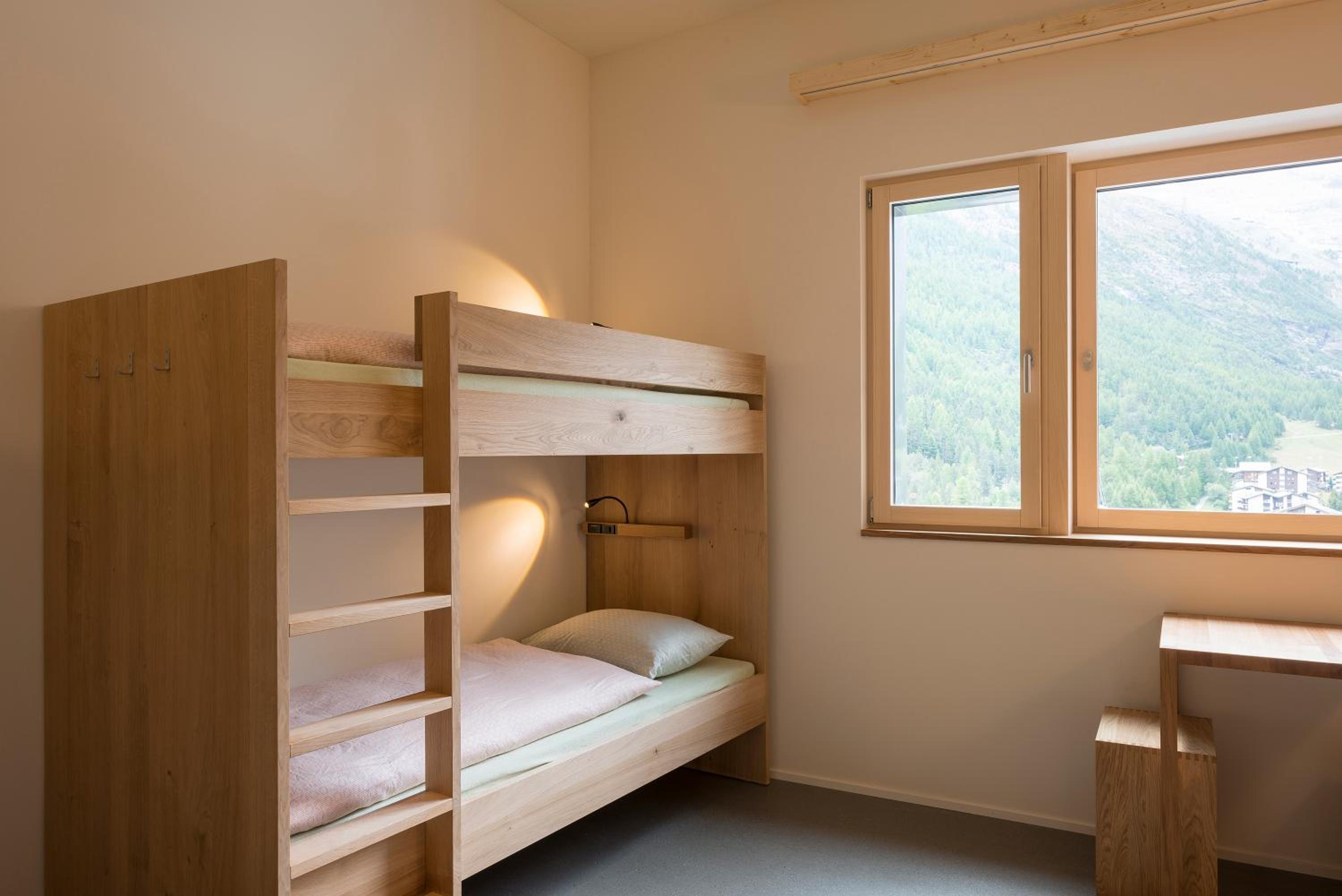 Bed in 4-Bed Mixed Dormitory Room with Shower - incl. Pool Access photo 3