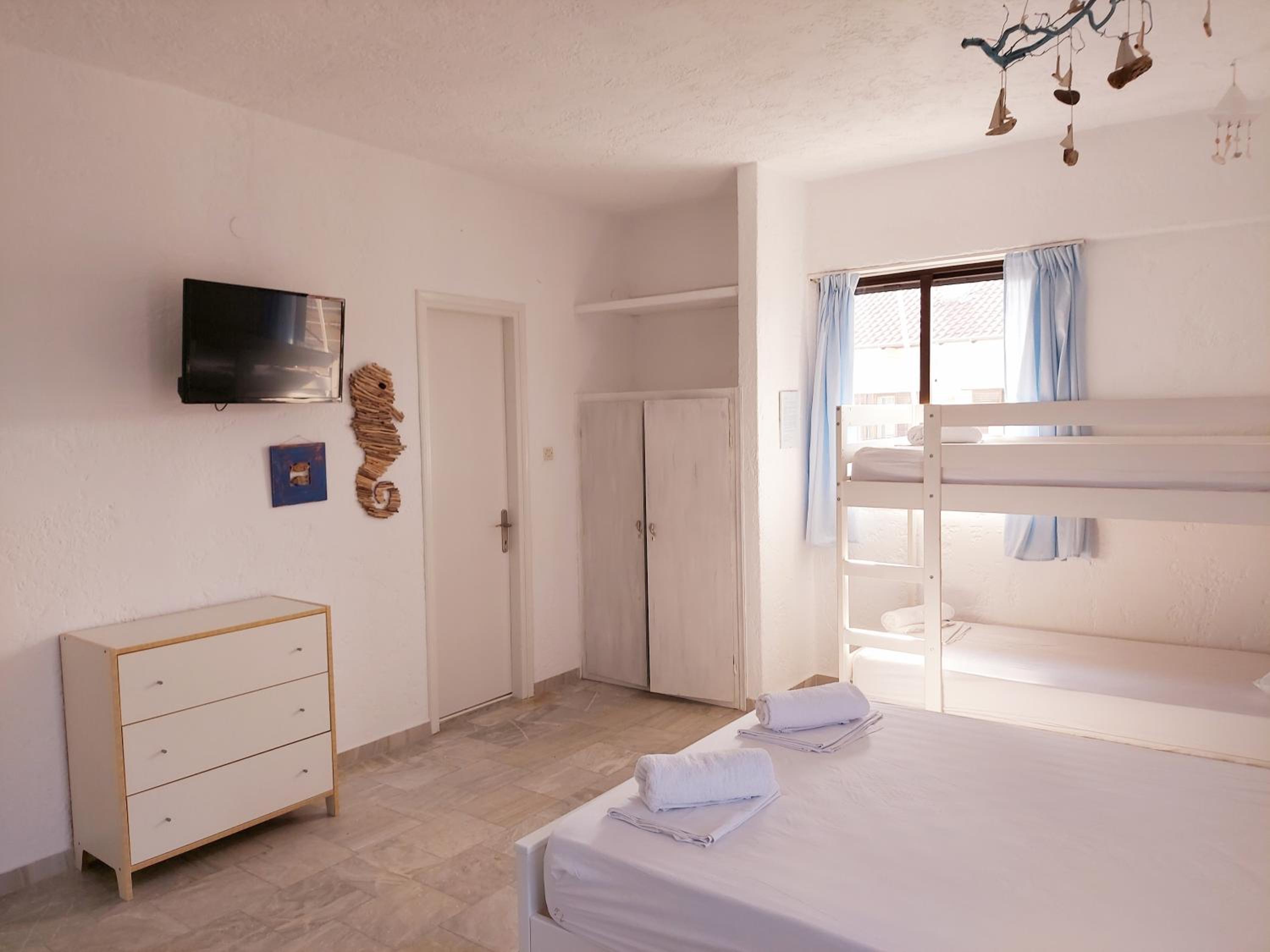 Premium Quadruple Room - Photo 1