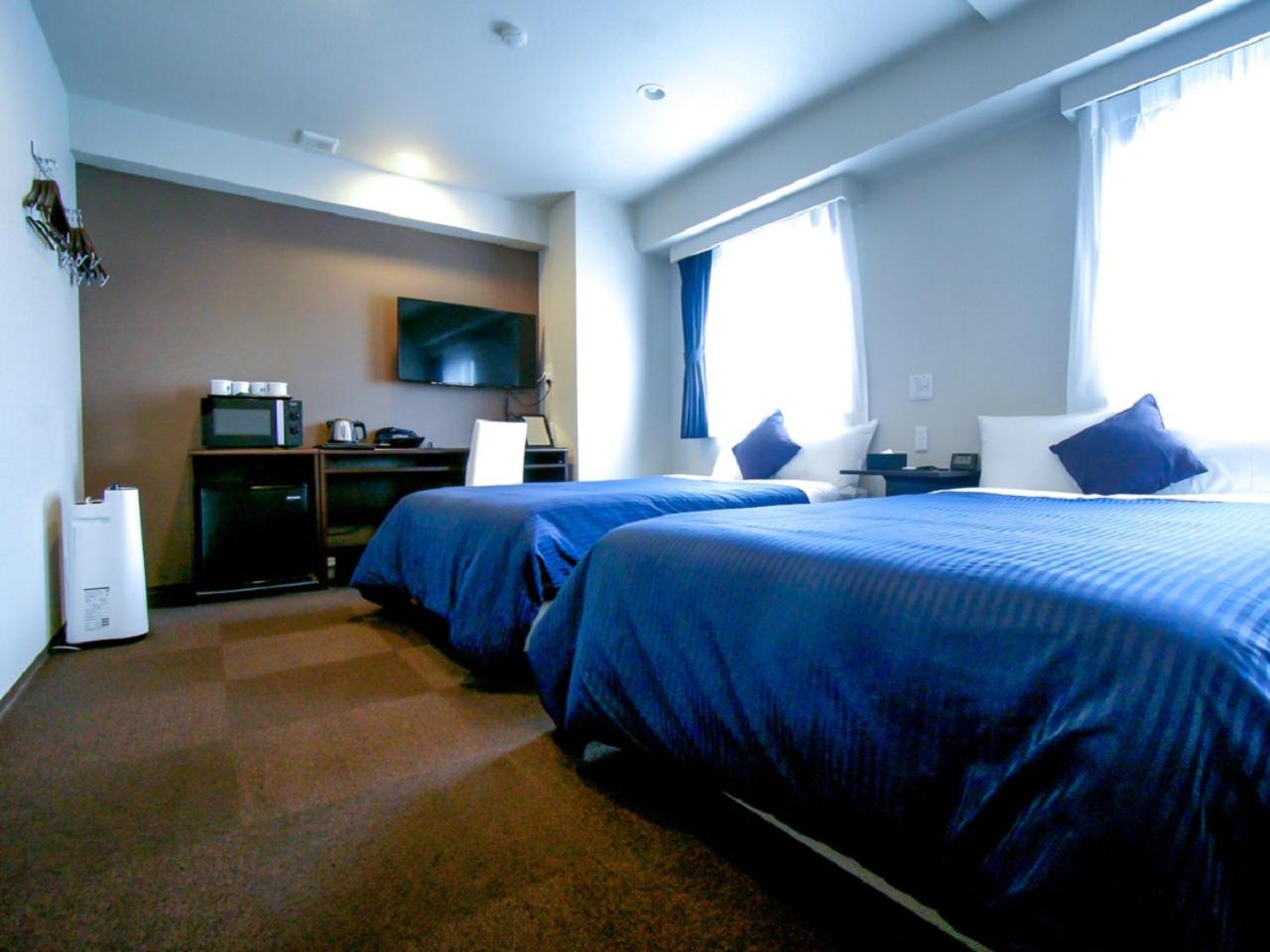 Twin Room - Non-Smoking photo 2