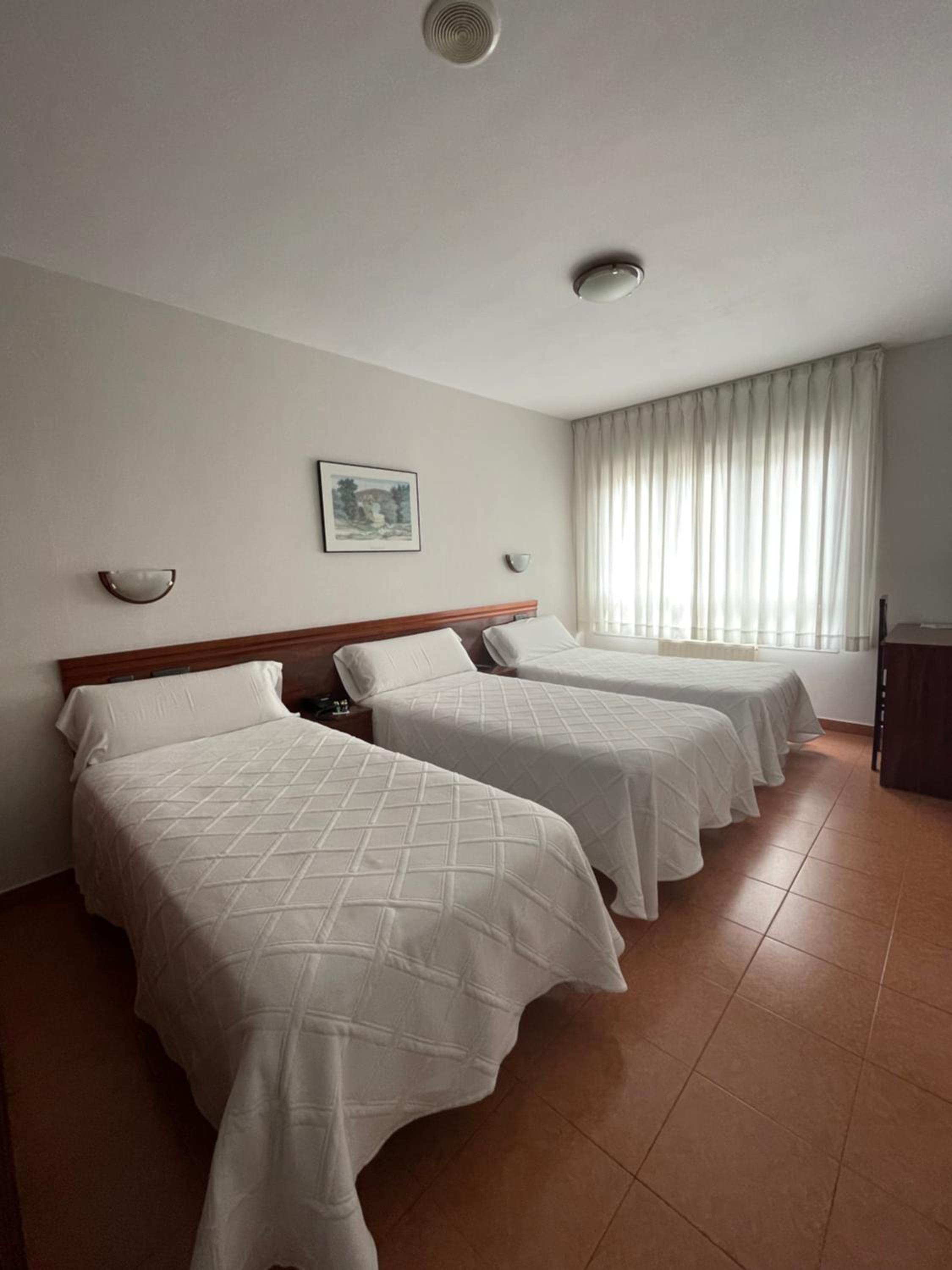 Triple Room - Photo 1