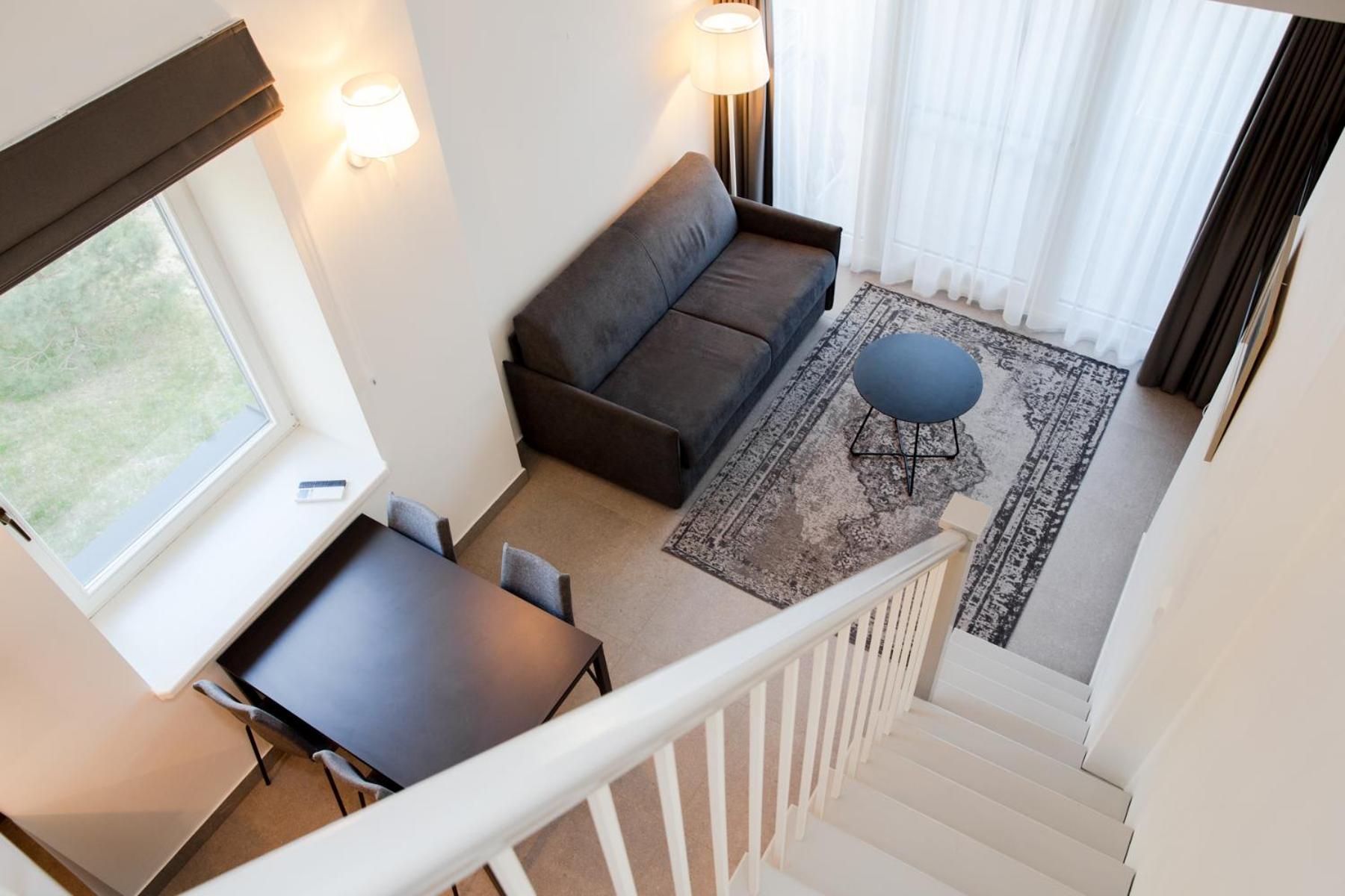 Quadruple Room with Balcony - Photo 16