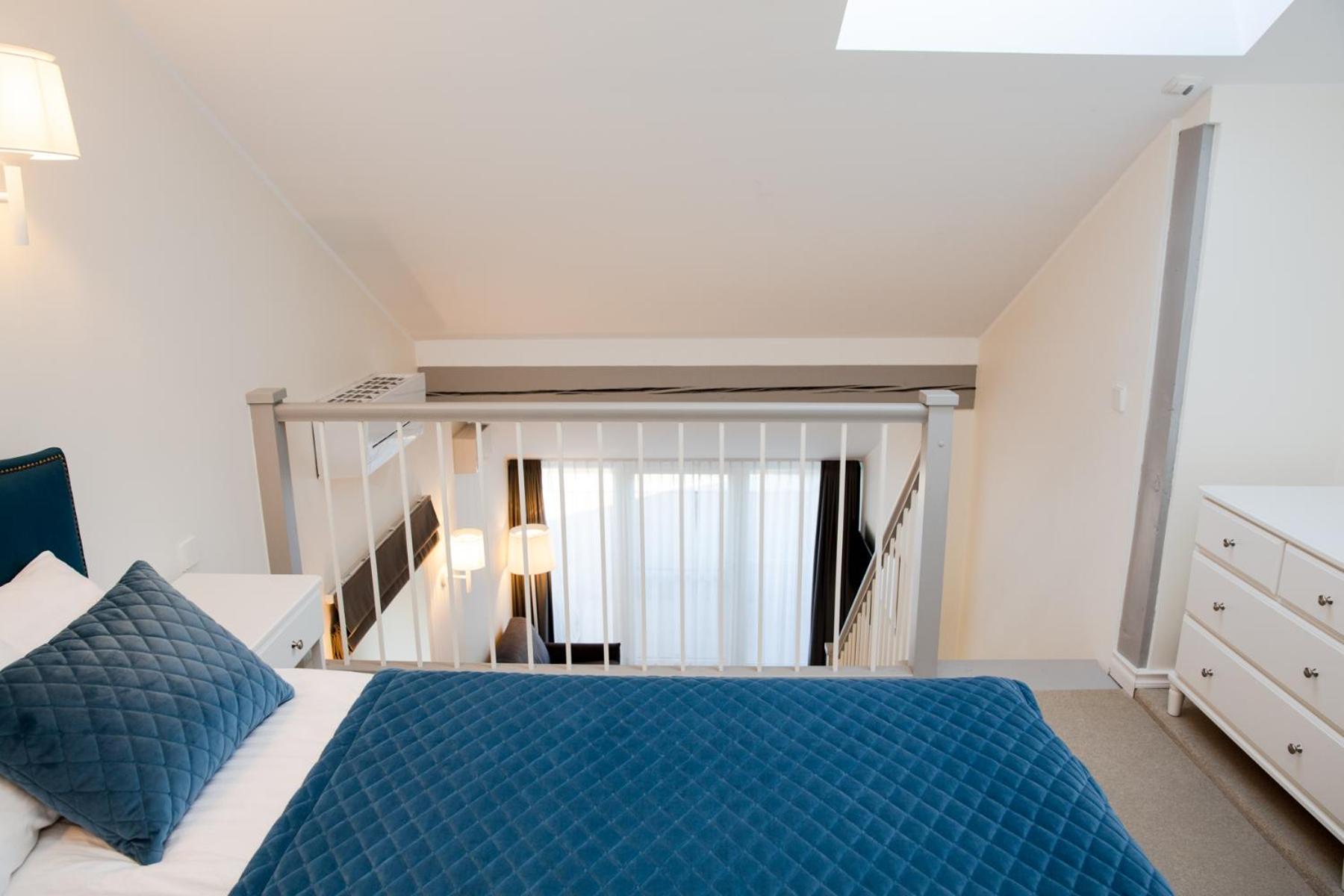 Quadruple Room with Balcony - Photo 18
