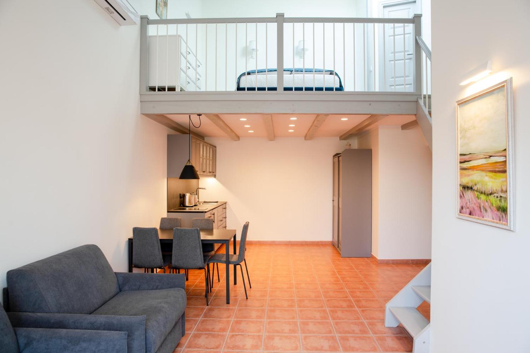 Family Room with Balcony - Photo 12