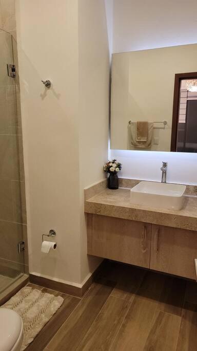 Four-Bedroom House - Photo 36