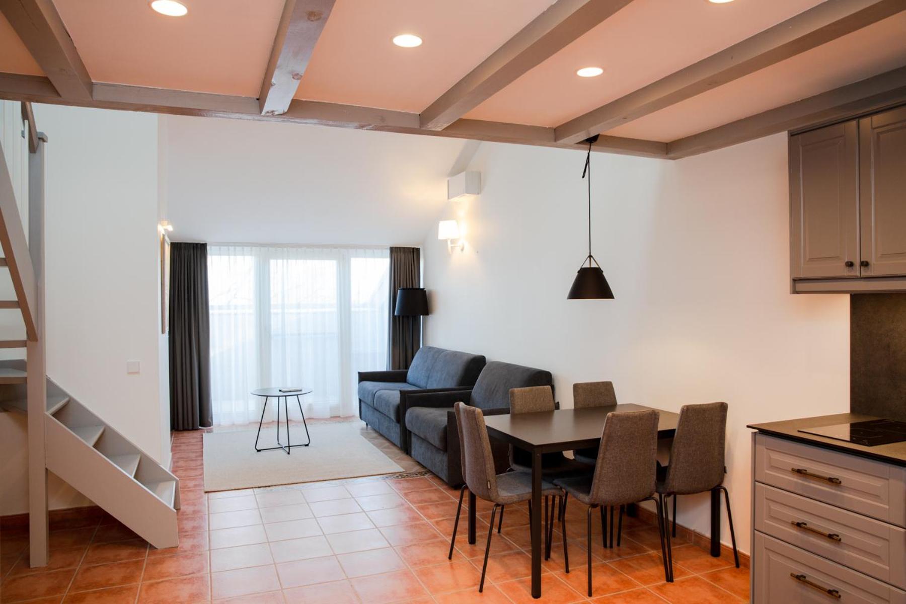 Family Room with Balcony - Photo 1