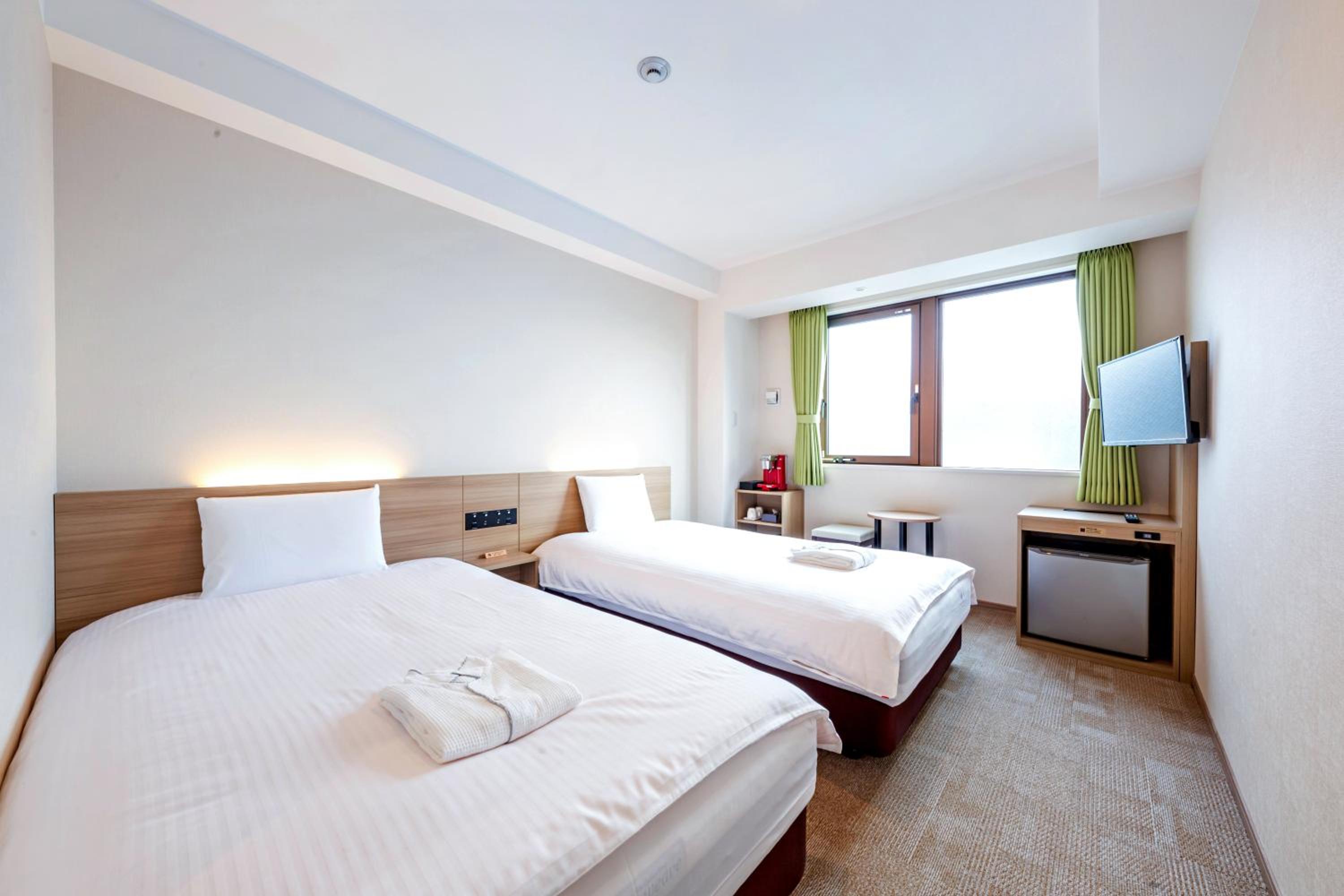 Standard Twin Room - Photo 8