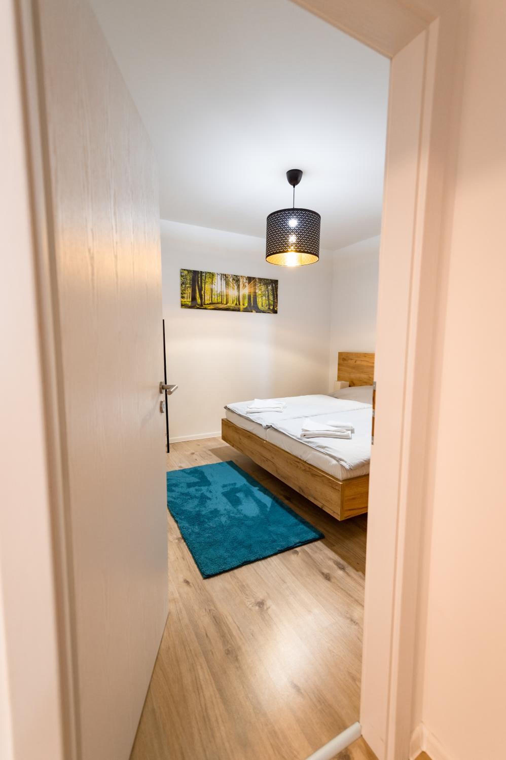 Two-Bedroom Apartment - Photo 37