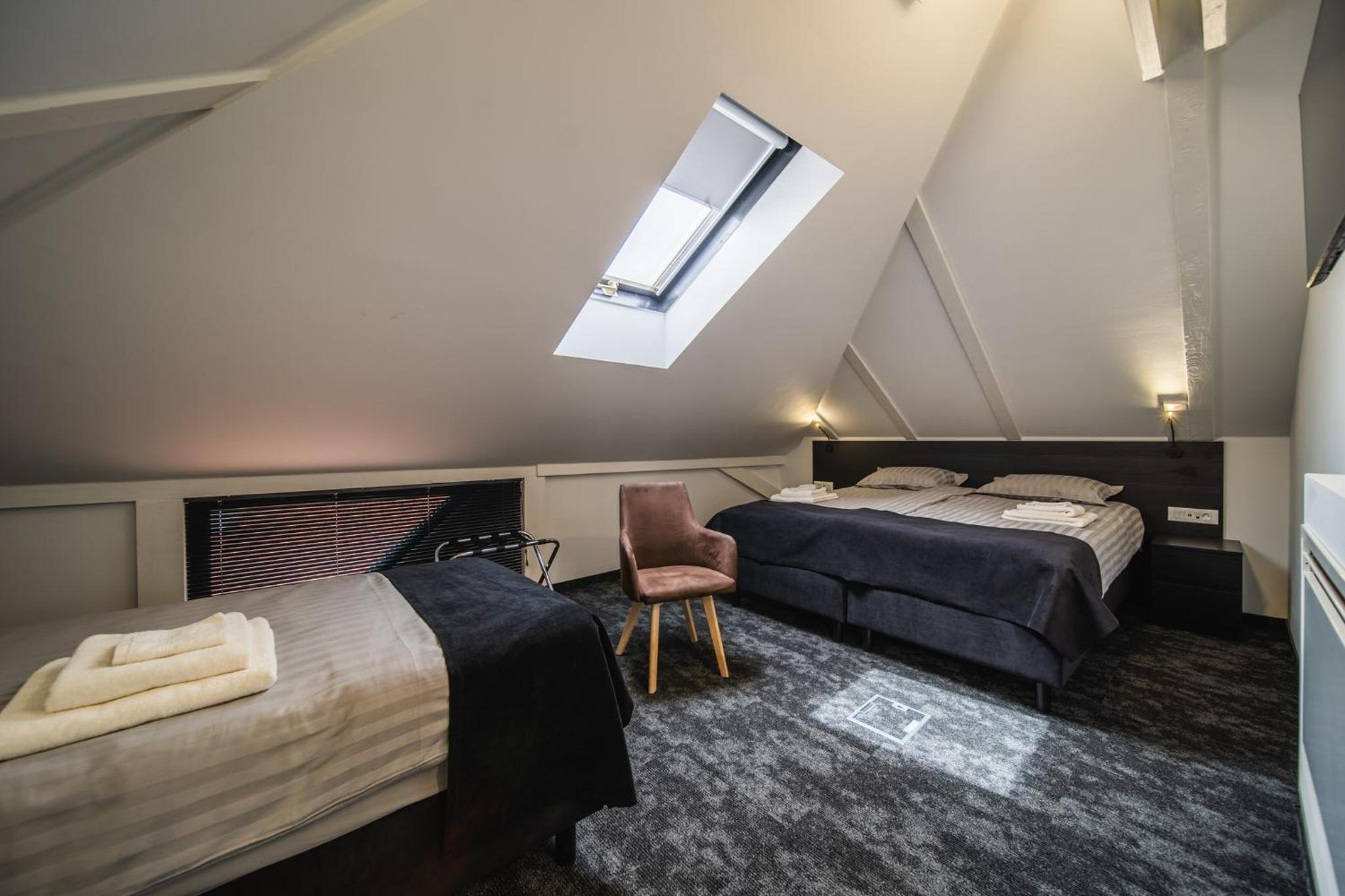 Deluxe Triple Room - Photo 1