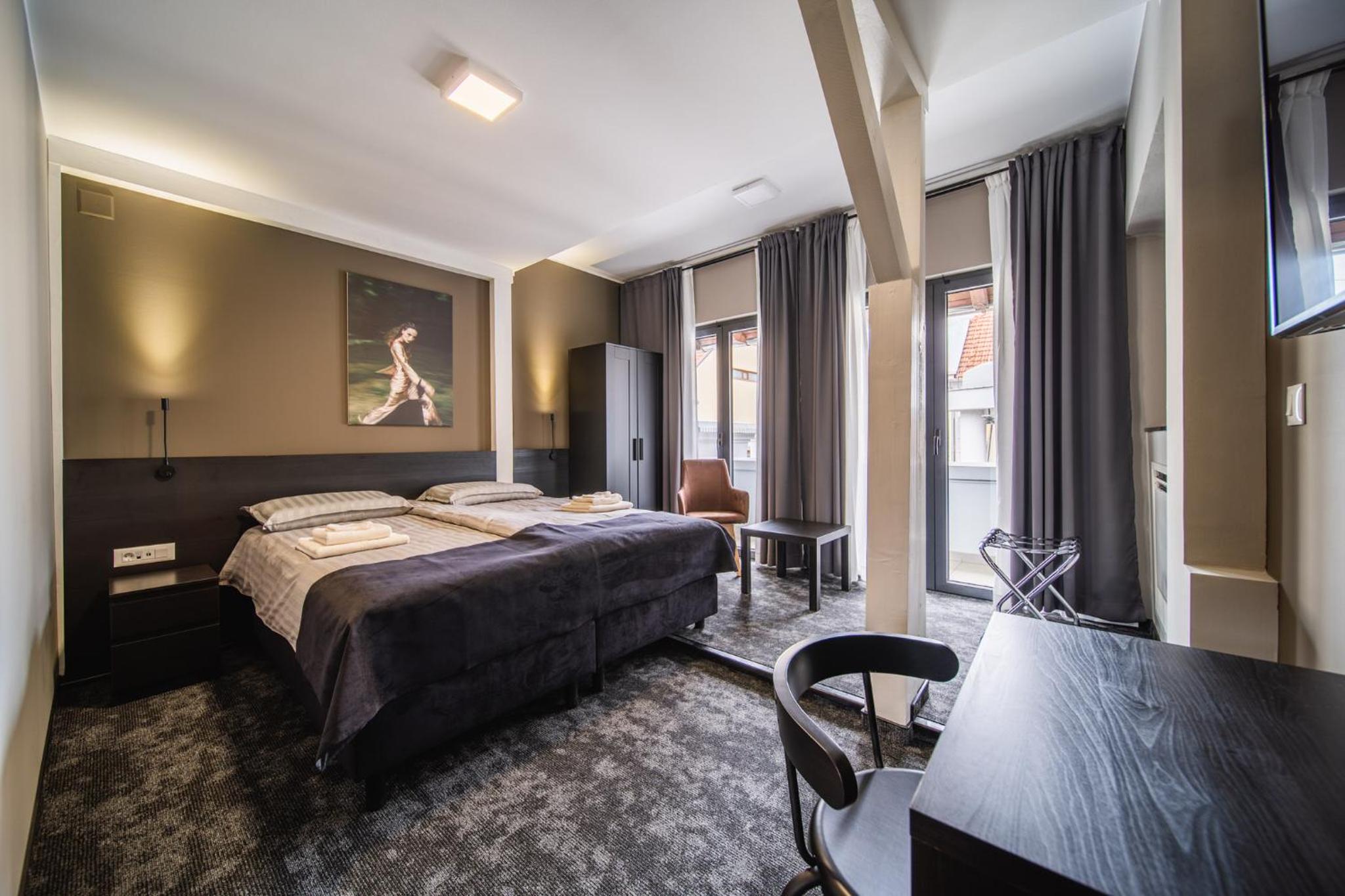 Deluxe Queen Room with Two Queen Beds - Photo 1