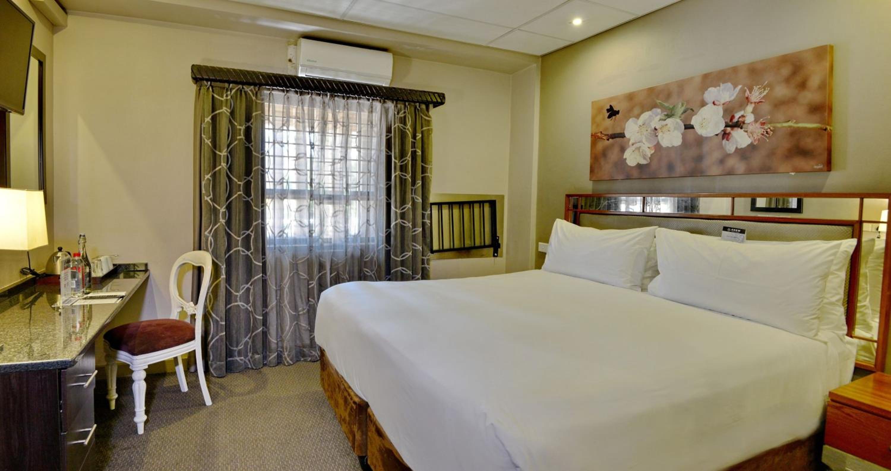 Deluxe Room - Photo 1