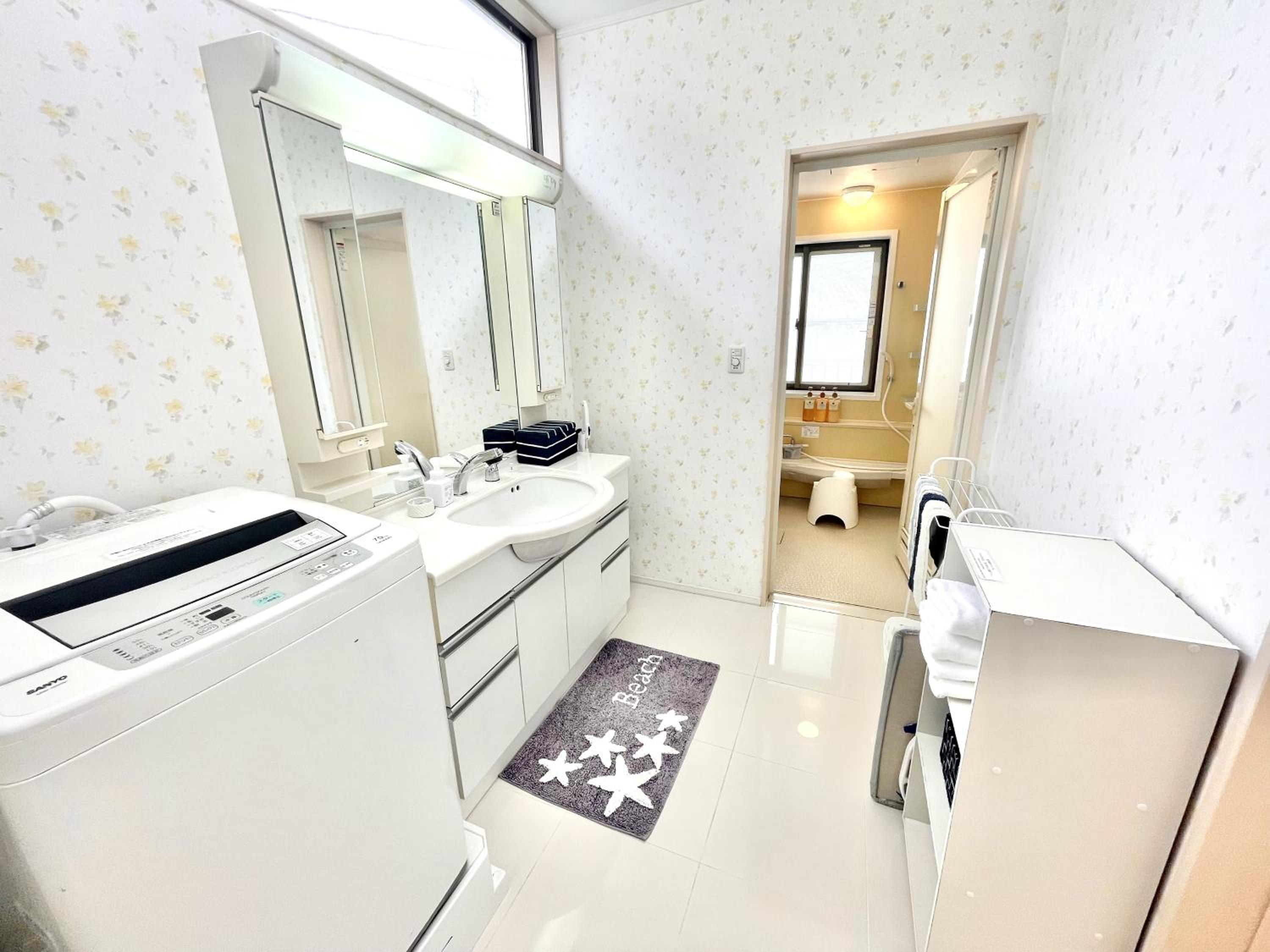 Three-Bedroom House - Photo 22