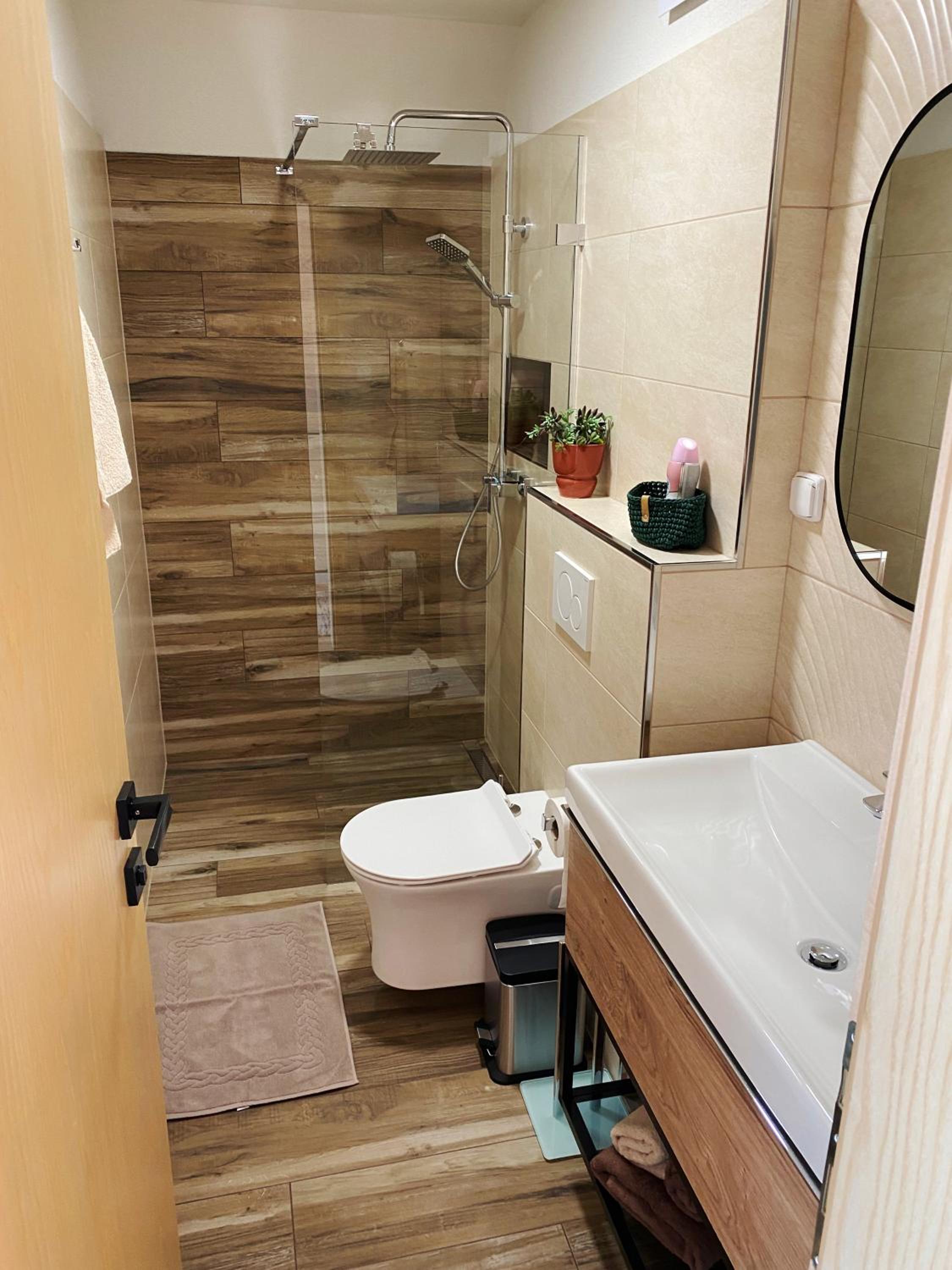 Three-Bedroom House - Photo 24