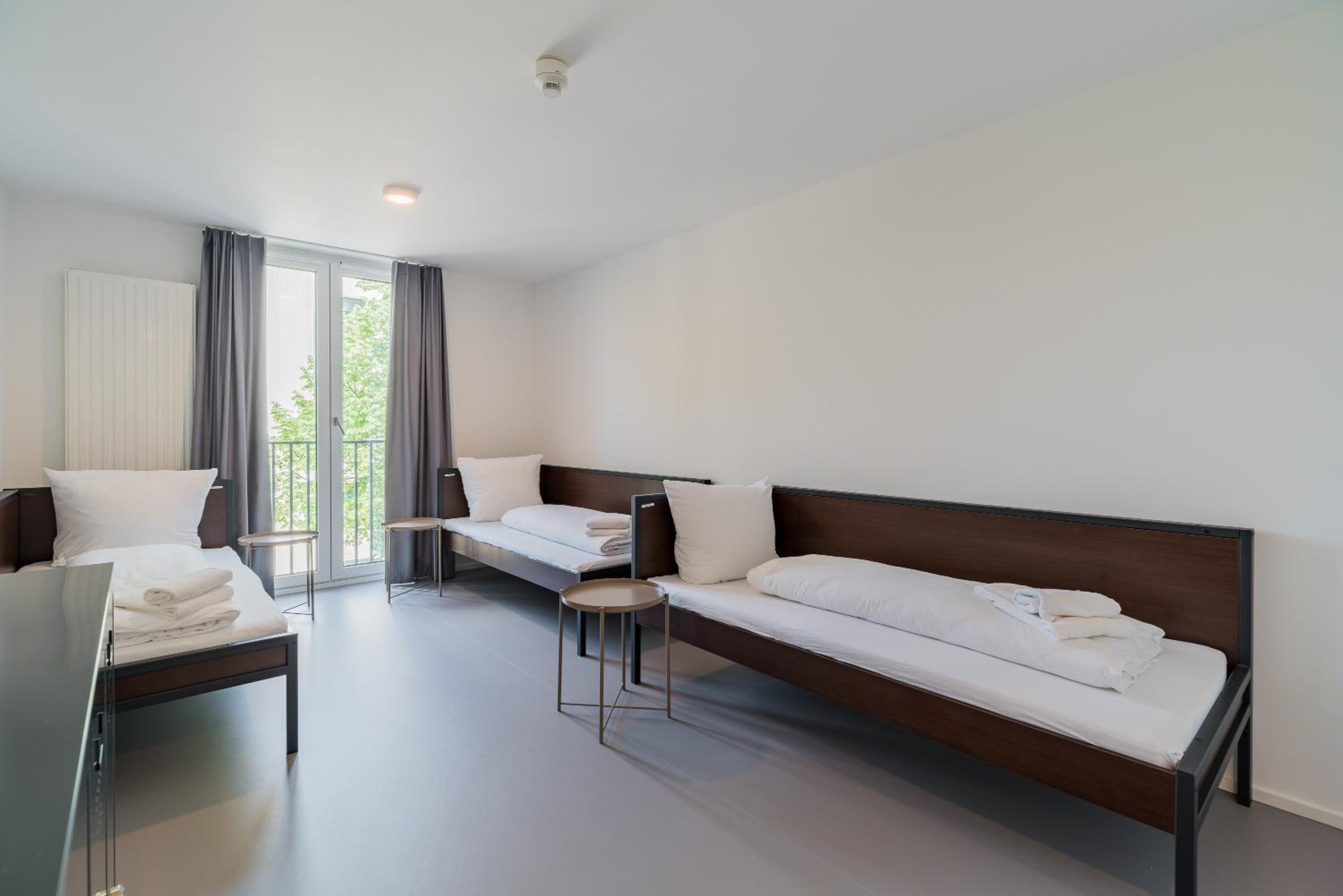 Single Bed In Dormitory Room photo 2