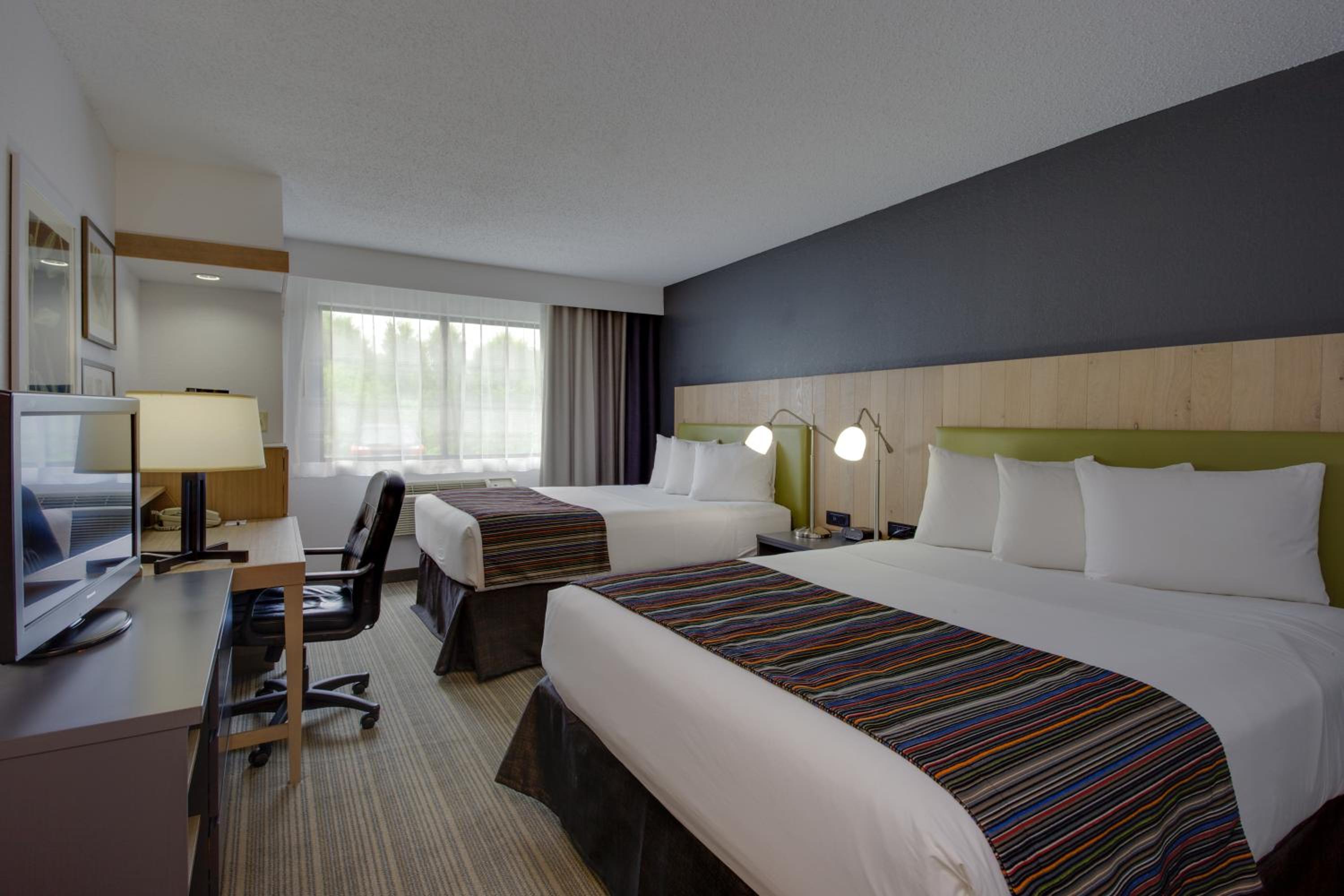 Queen Room with Two Queen Beds - Photo 1