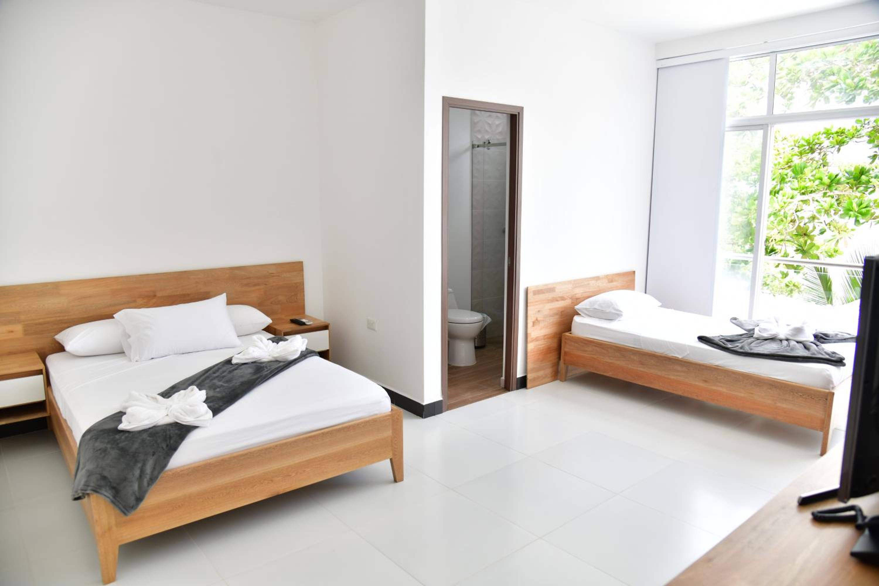 Deluxe Triple Room with Sea View