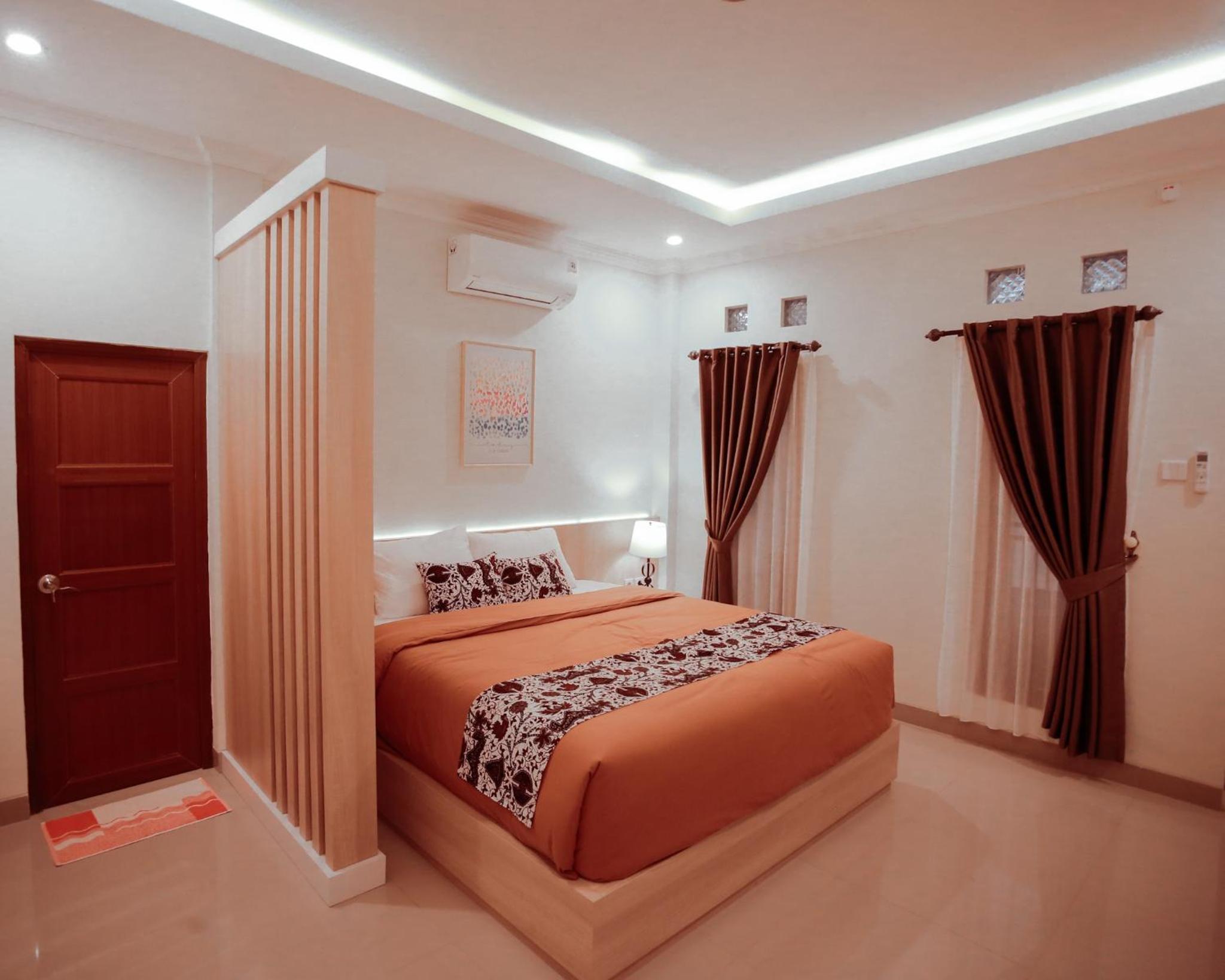 Deluxe King Room - Photo 7