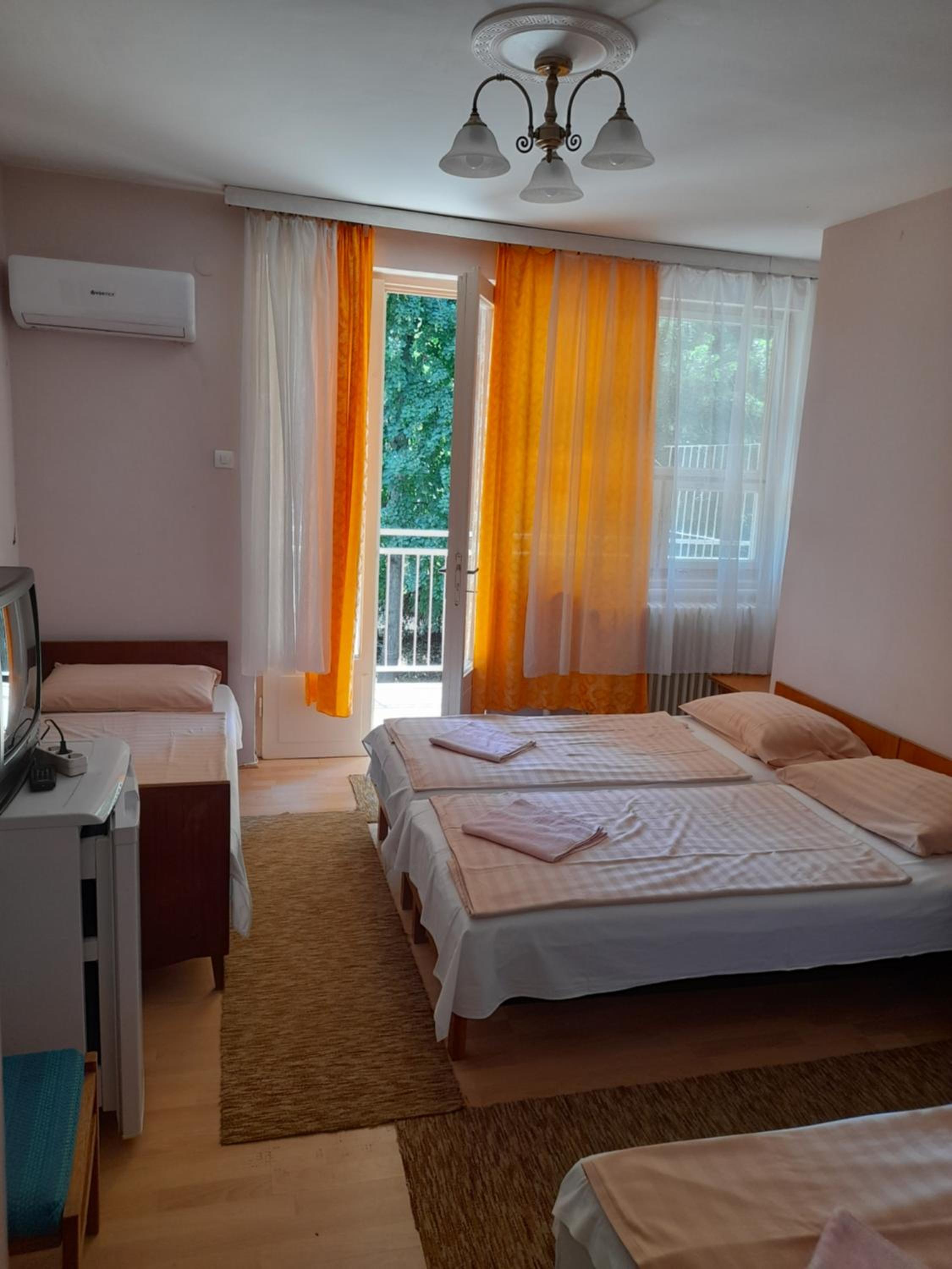 Quadruple Room with Balcony photo 2