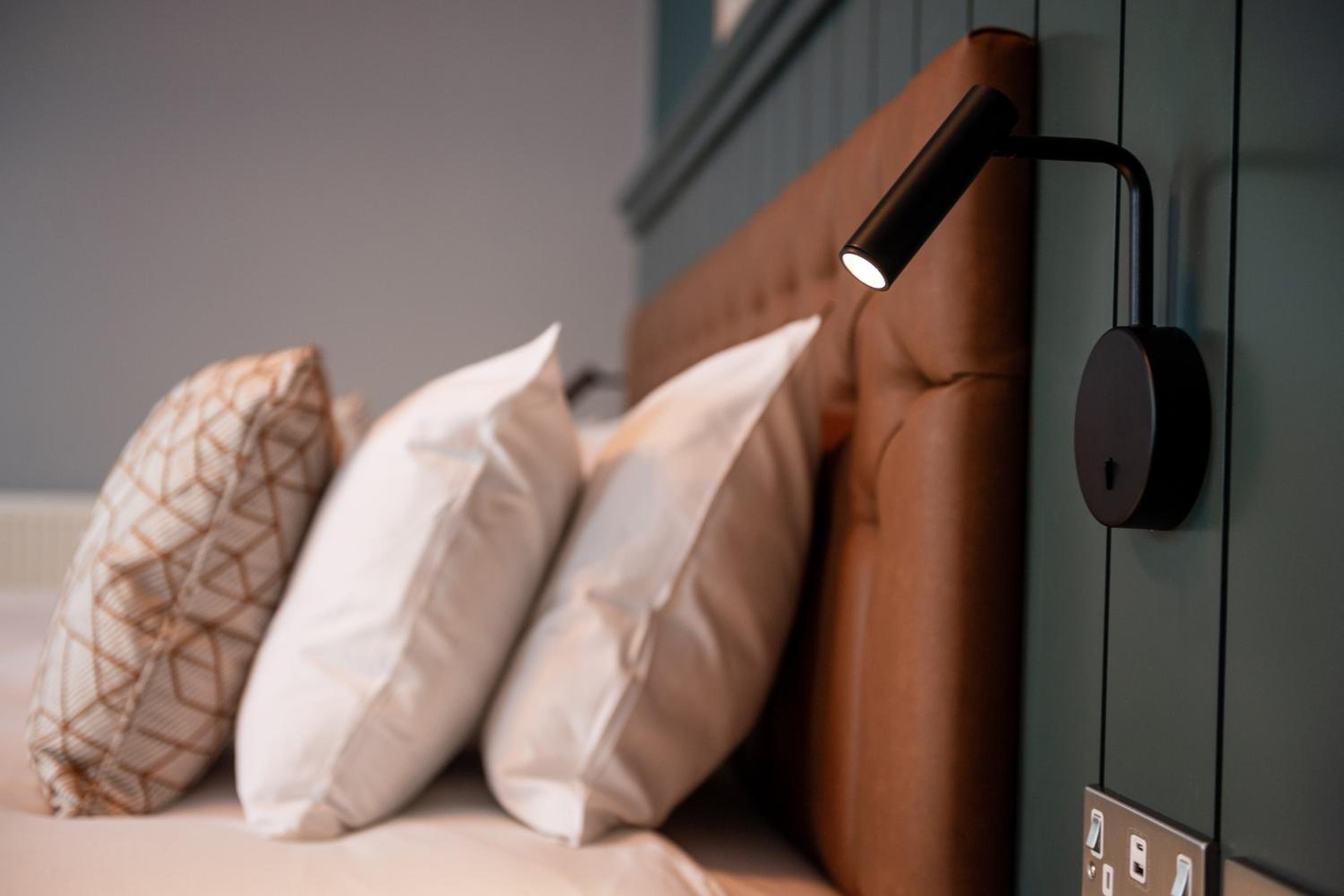 close up of the headboard of a hotel bed