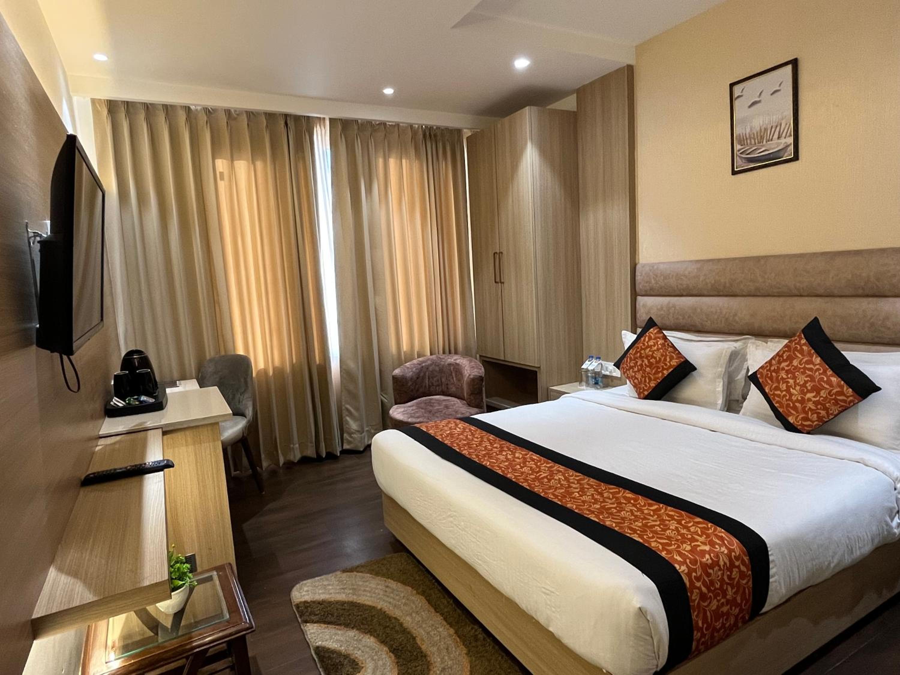 Deluxe Room - Photo 1