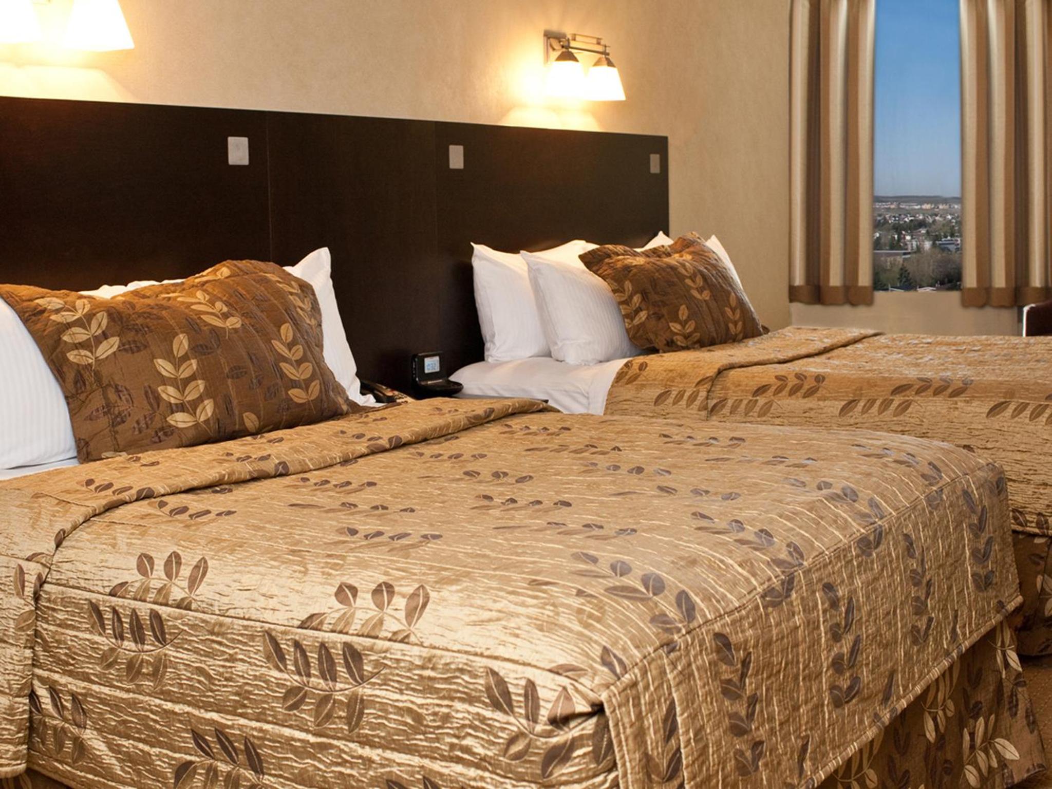 Superior Queen Room with Two Queen Beds - Photo 1