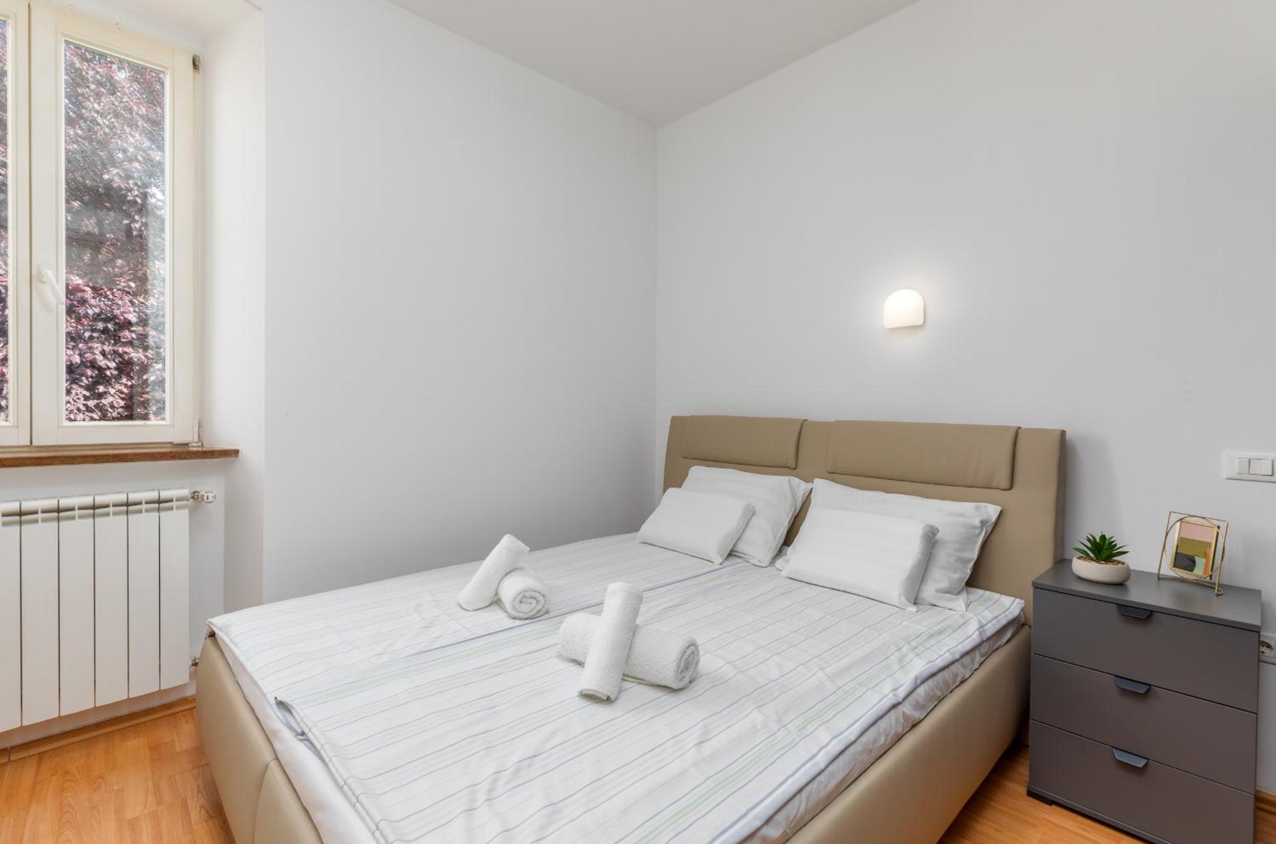 Three-Bedroom Apartment - Photo 19