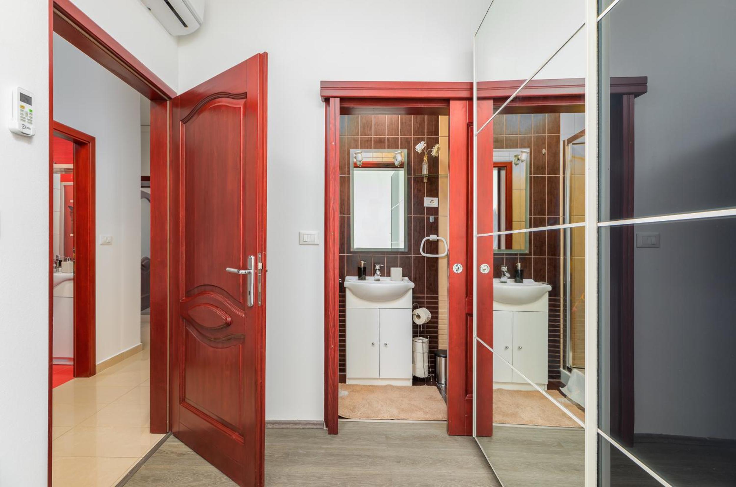 Three-Bedroom Apartment - Photo 25