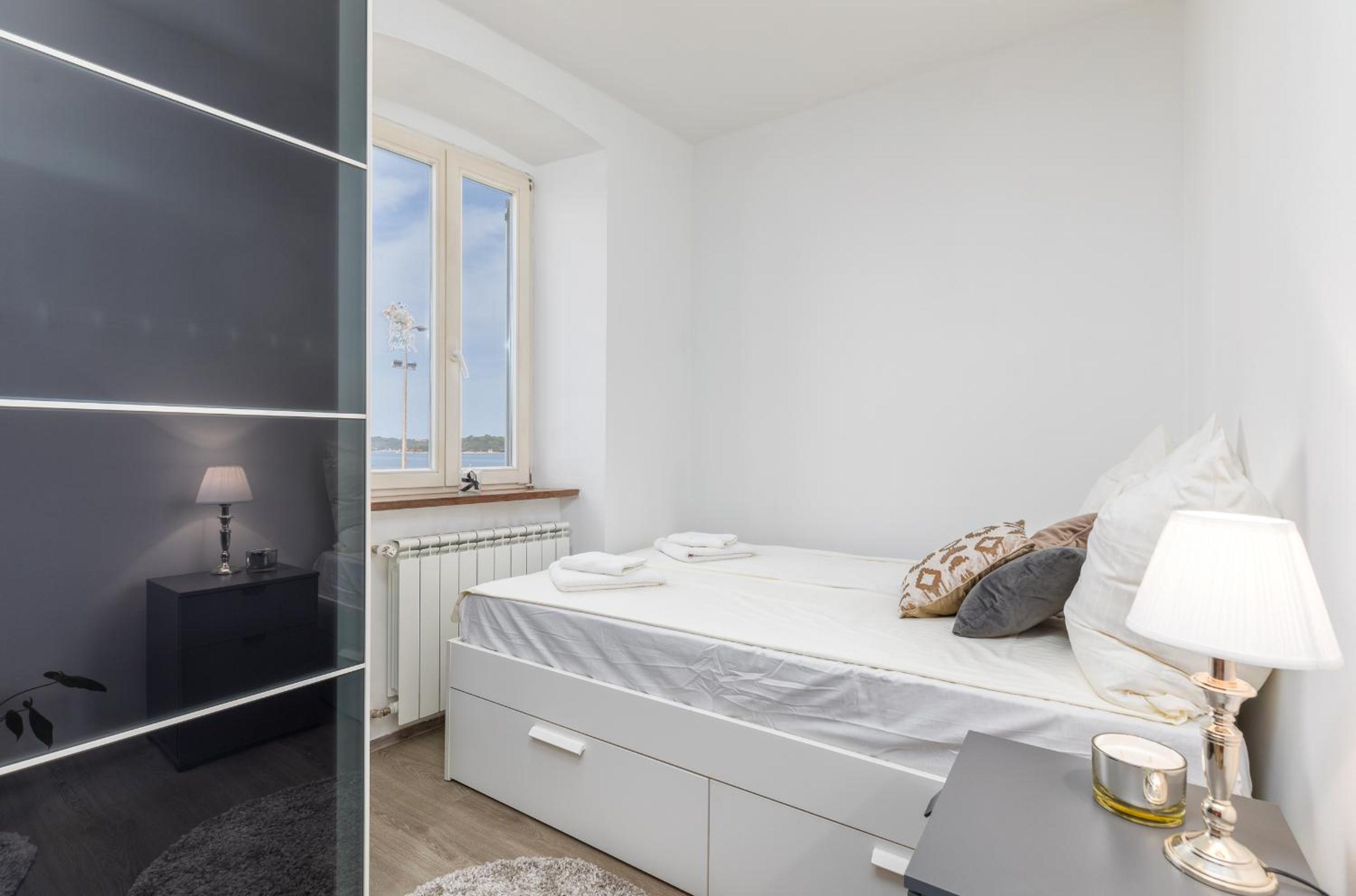 Three-Bedroom Apartment - Photo 26