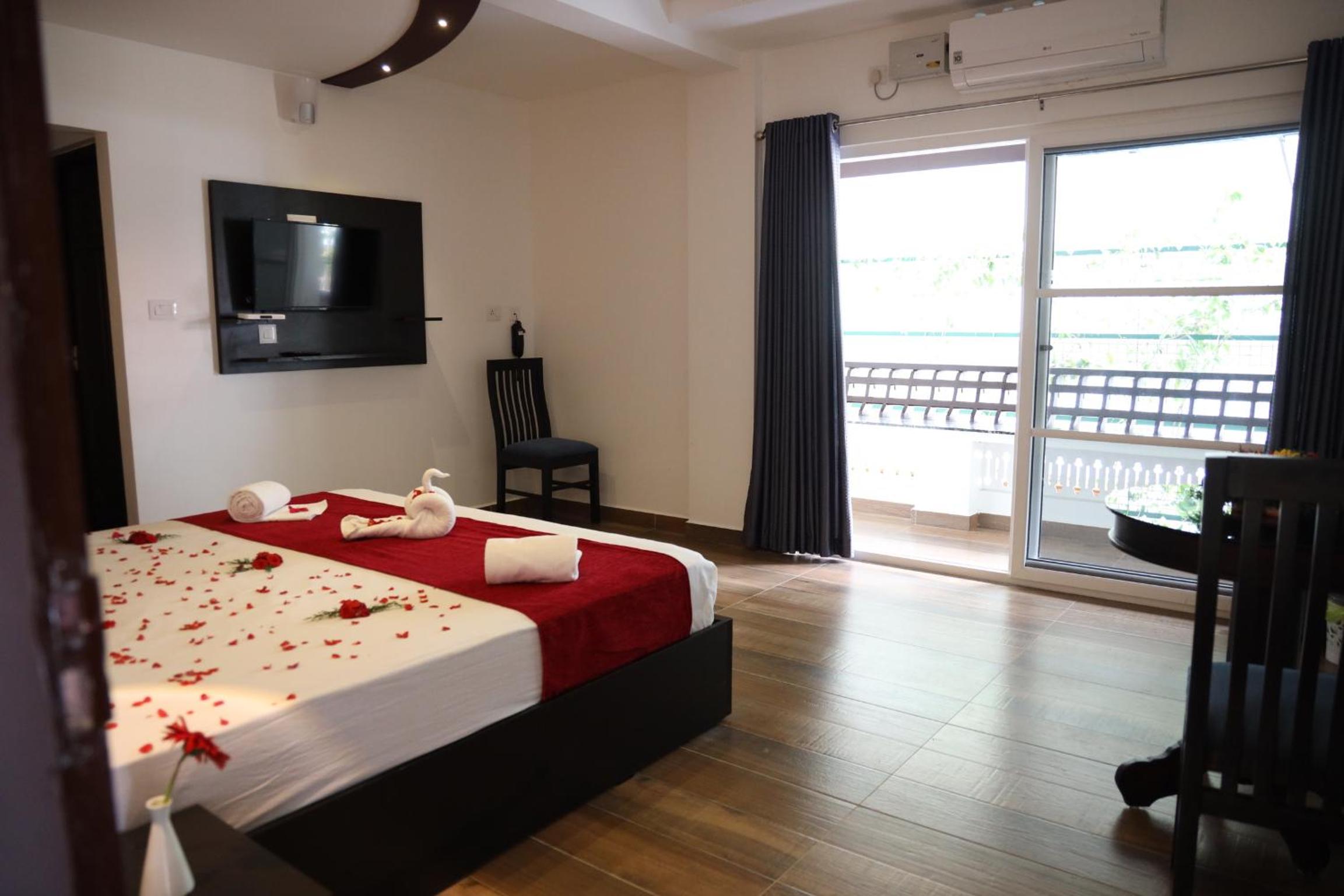 Deluxe Room - Photo 5