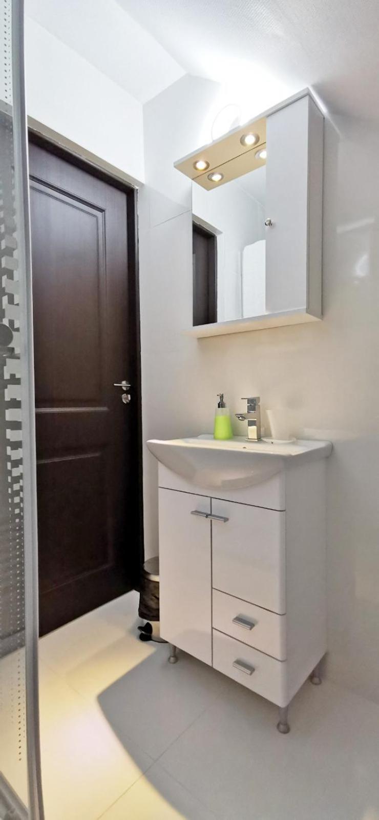 Deluxe Triple Room - Photo 8