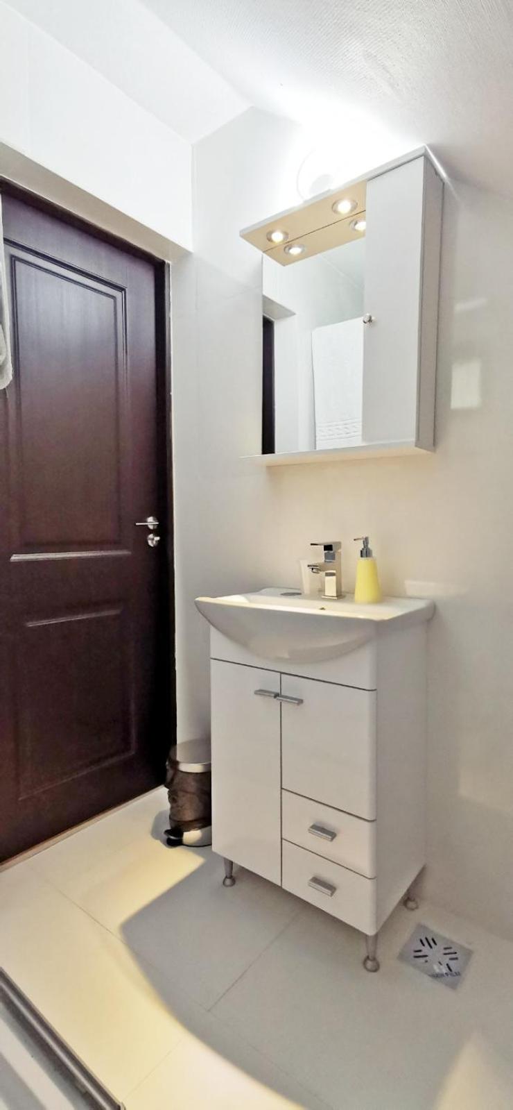 Deluxe Triple Room - Photo 11
