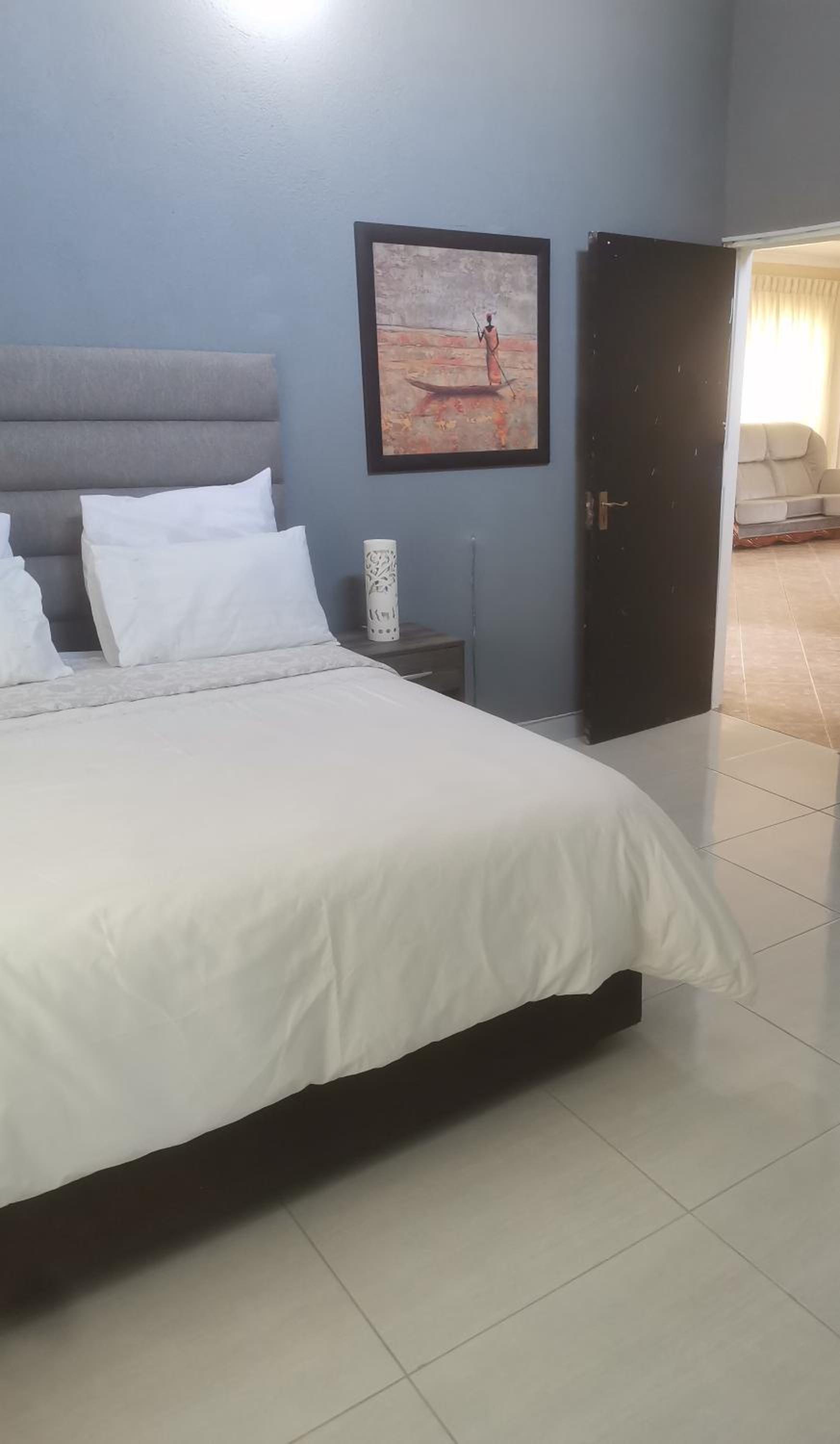 Four-Bedroom House - Photo 36