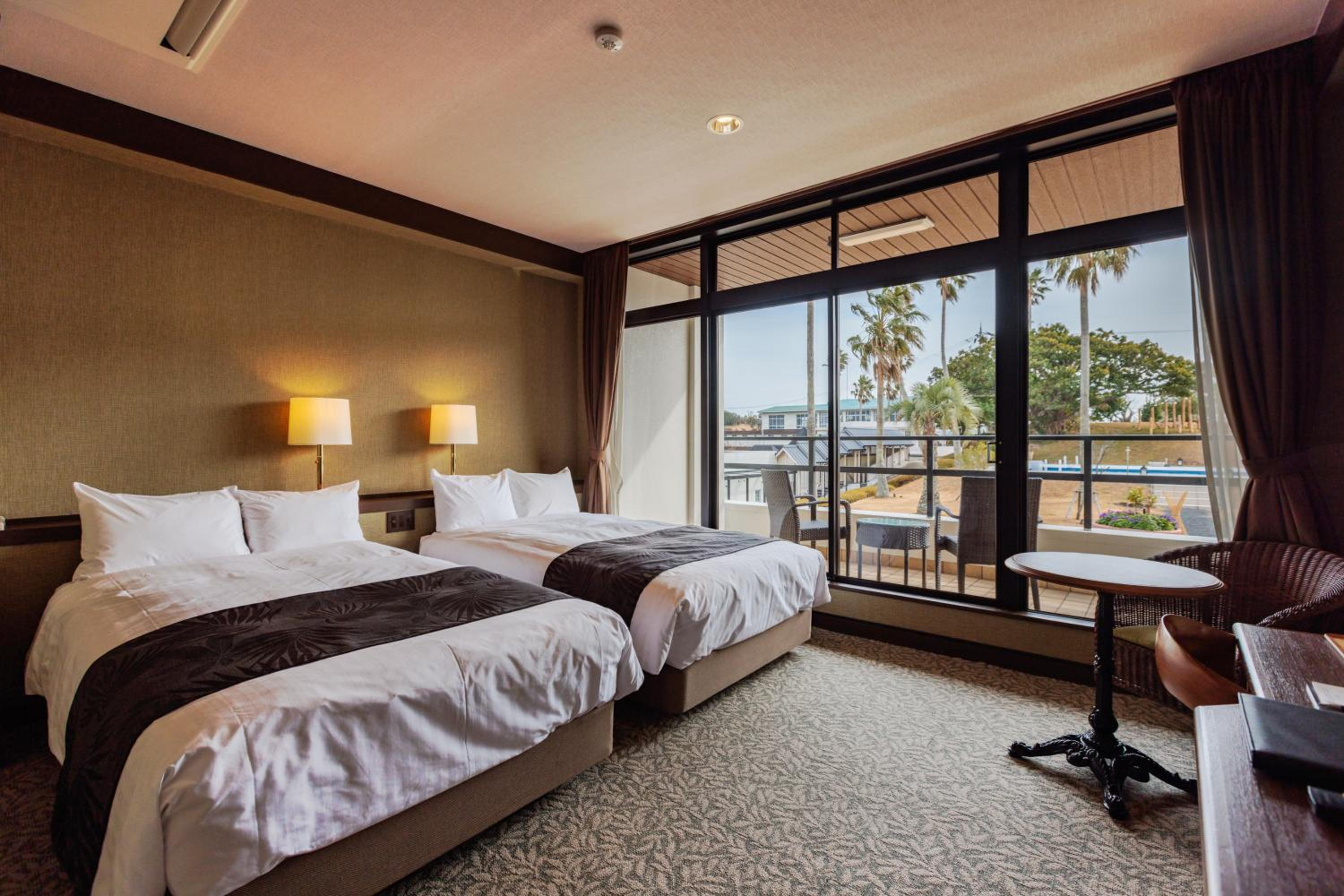 Standard Twin Room with Balcony and Garden View - Photo 1