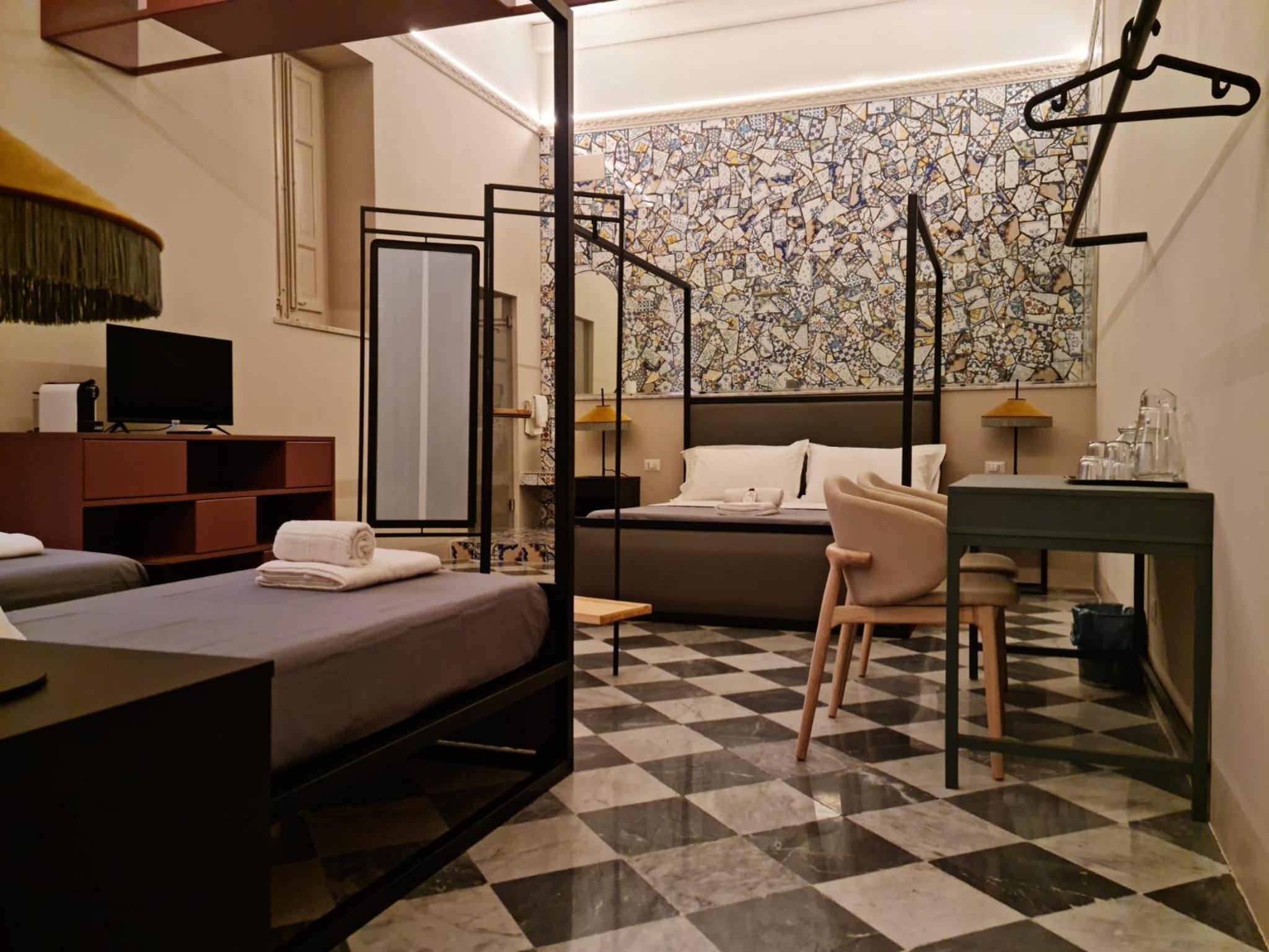 Deluxe Quadruple Room - Photo 1