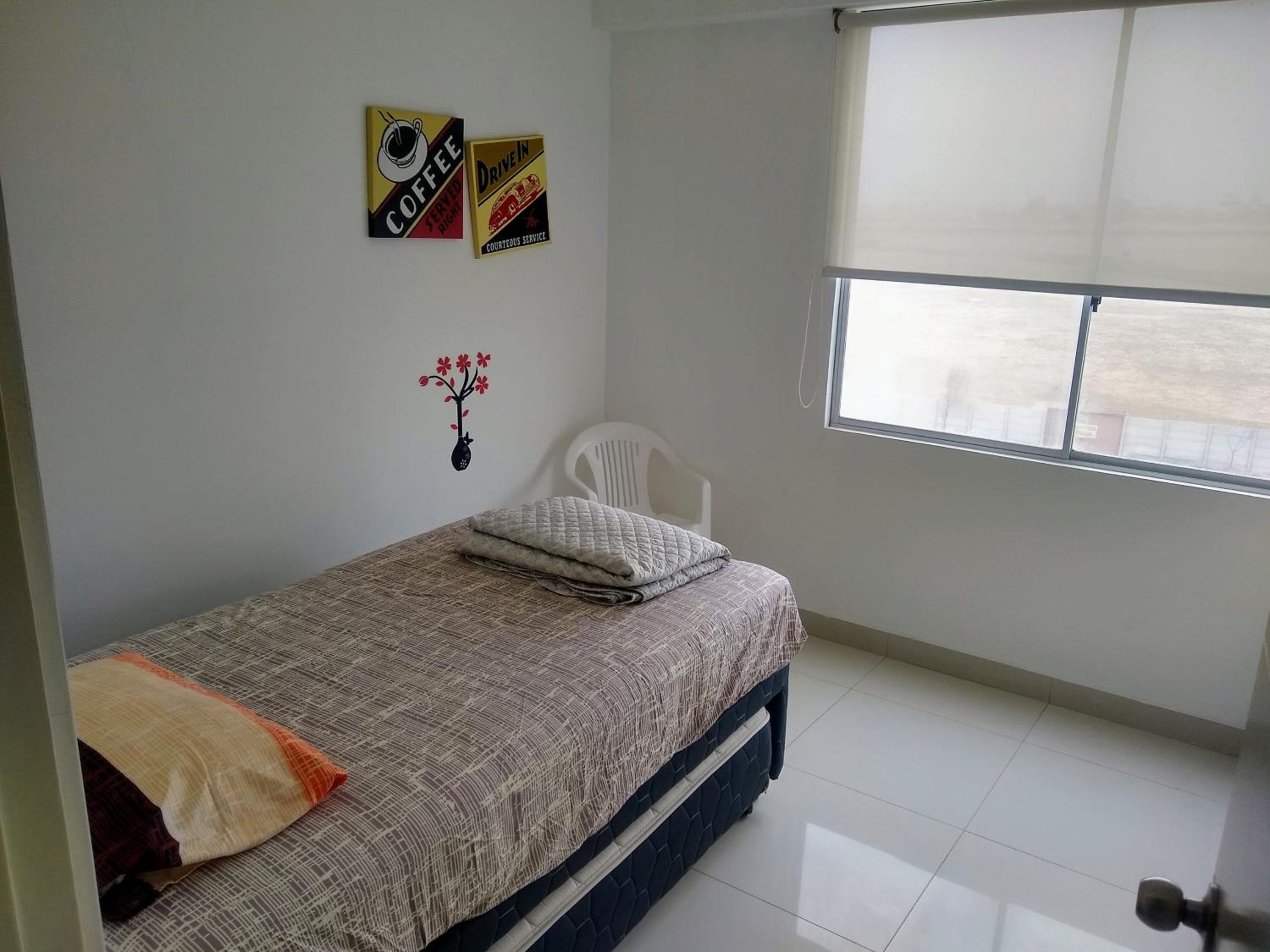 Three-Bedroom Apartment photo 1