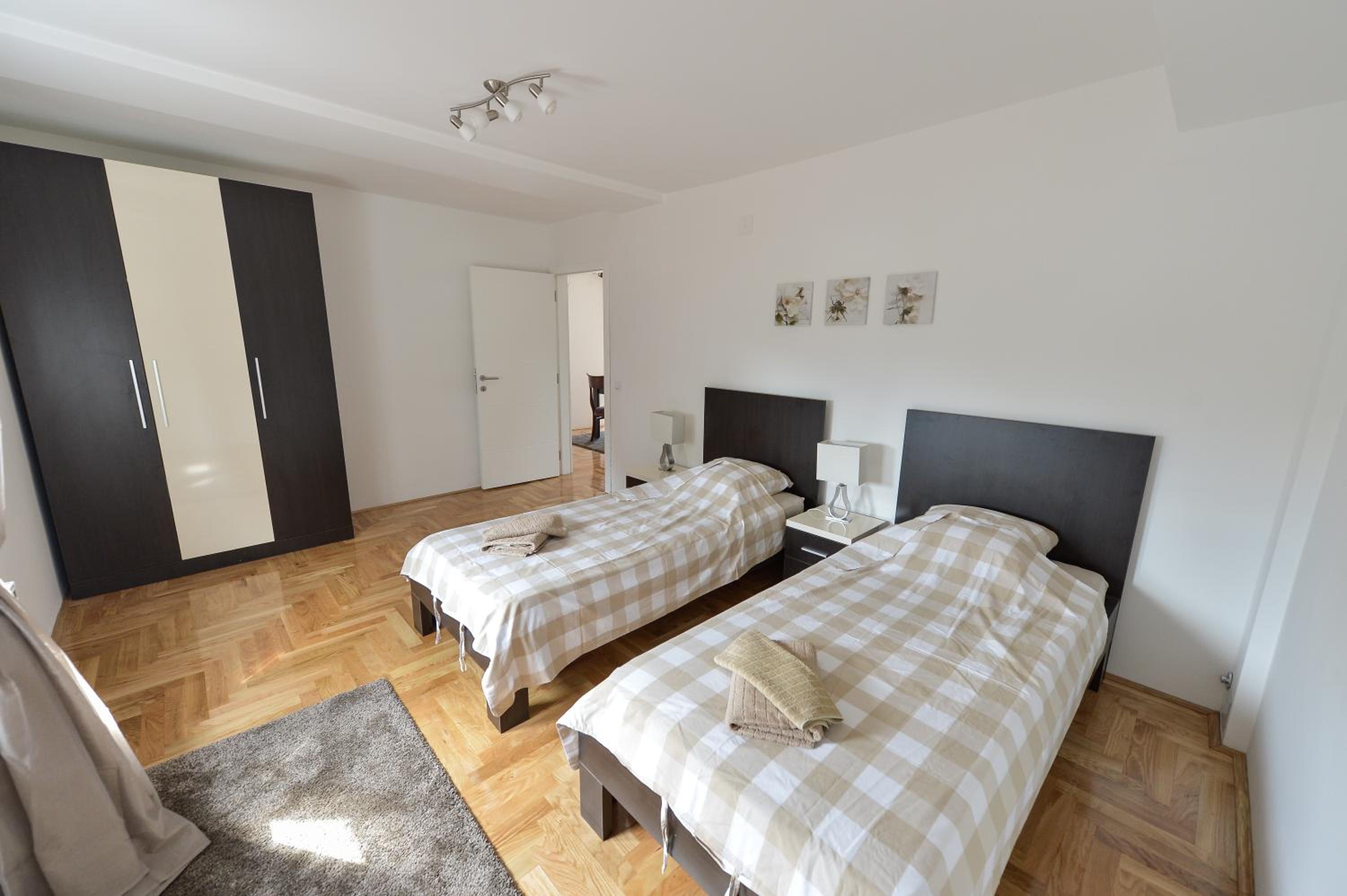 Three-Bedroom Apartment with Balcony photo 3