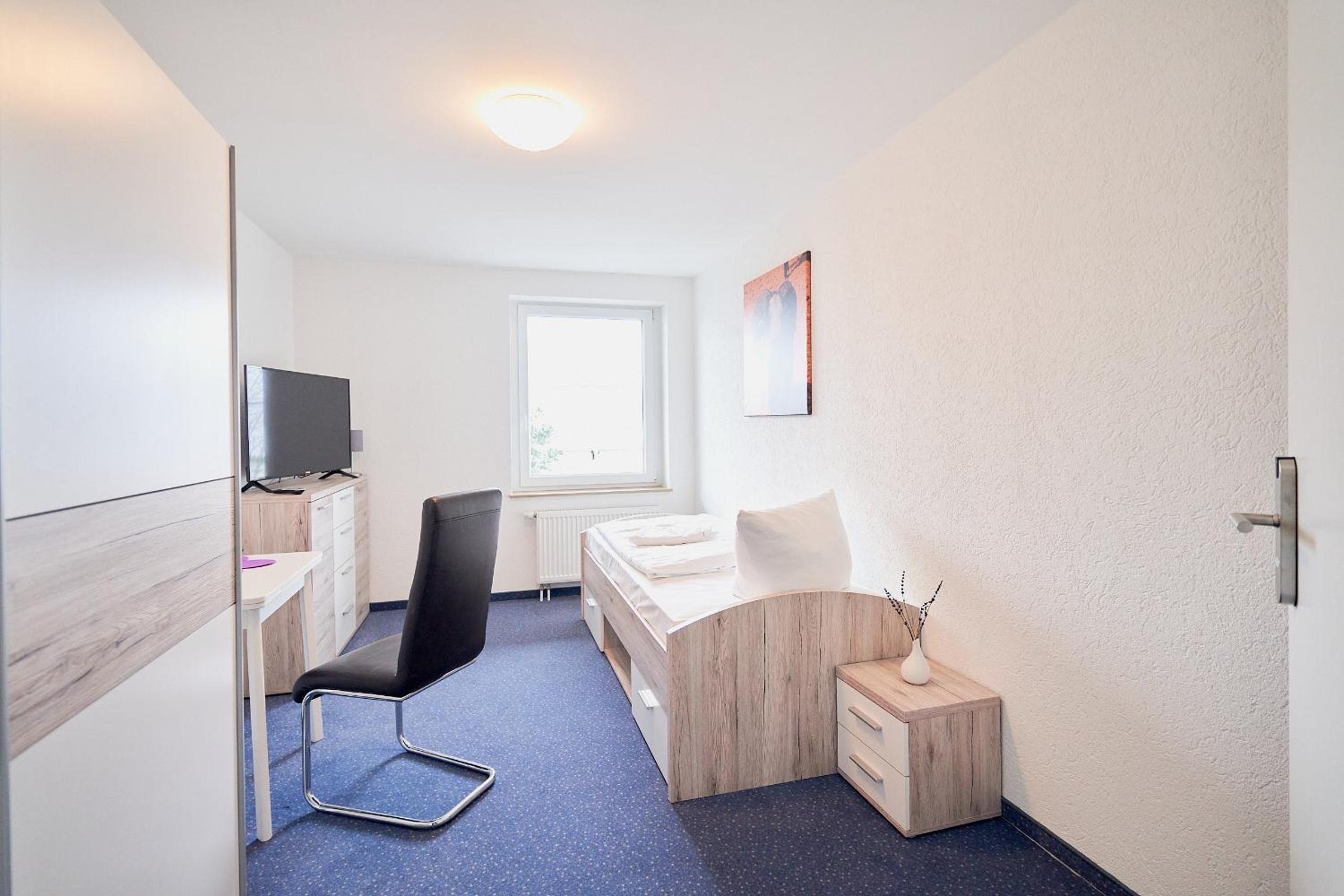 Single Room with Shared Shower and Toilet