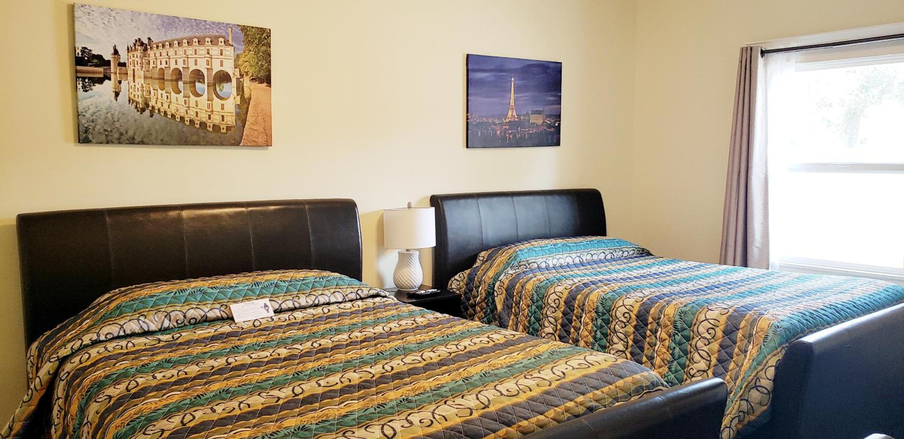 Queen Room with Two Queen Beds - Photo 1