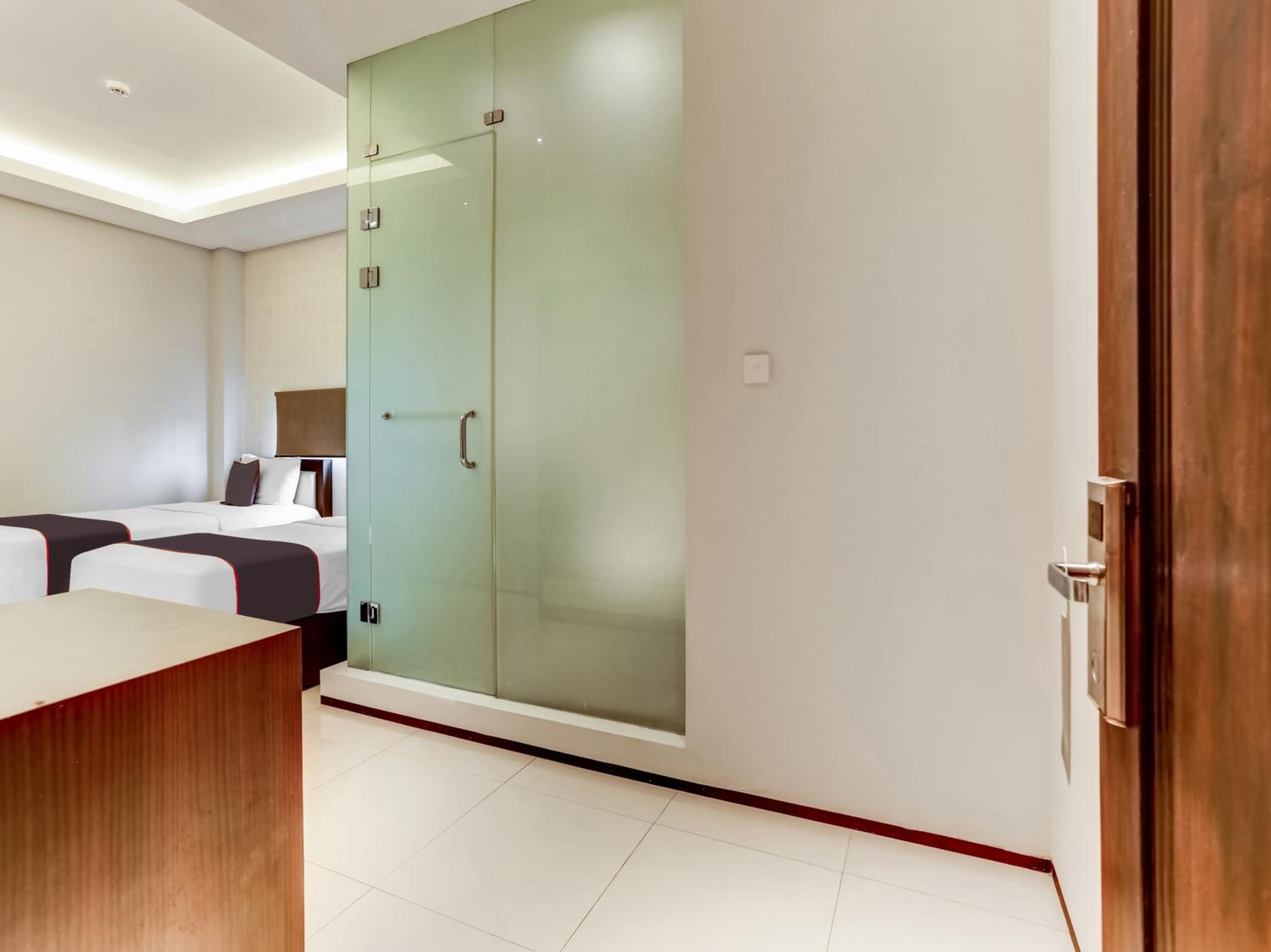 Delxue Twin Room - Photo 6