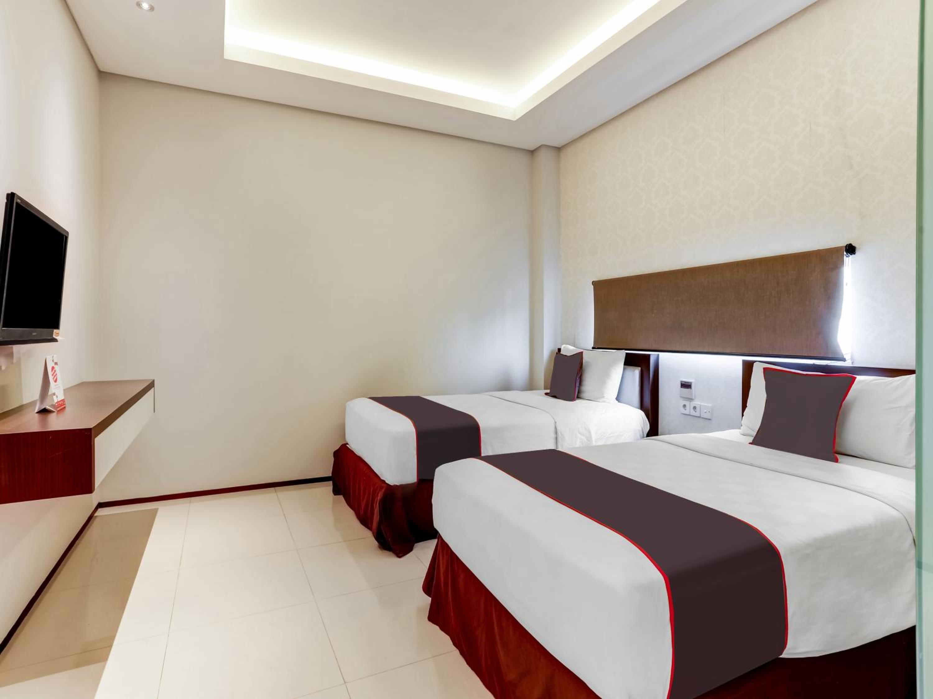 Delxue Twin Room - Photo 1