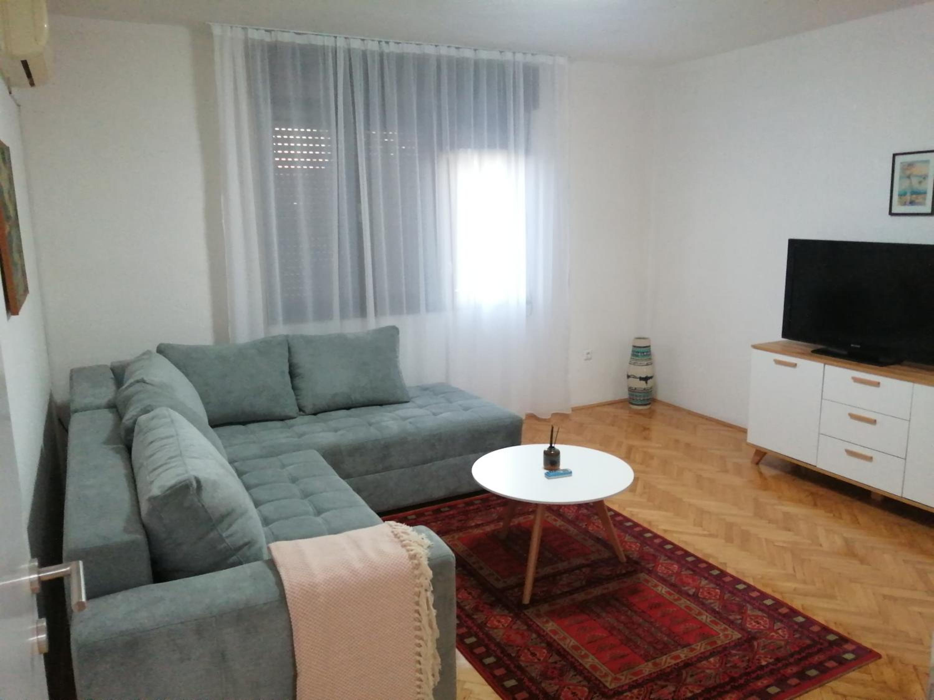Three-Bedroom Apartment photo 1