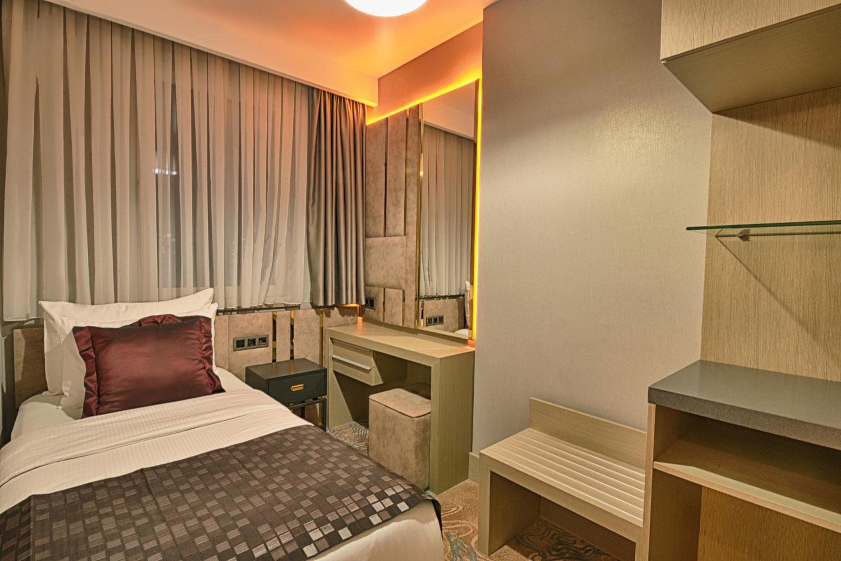 Superior Room with One King Bed and One Single Bed with Balcony and View