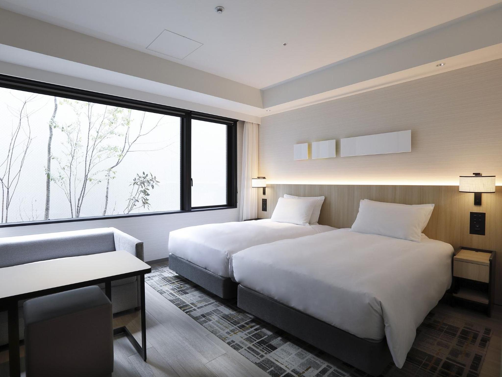 Twin Room with Bathtub - Garden View - Photo 2