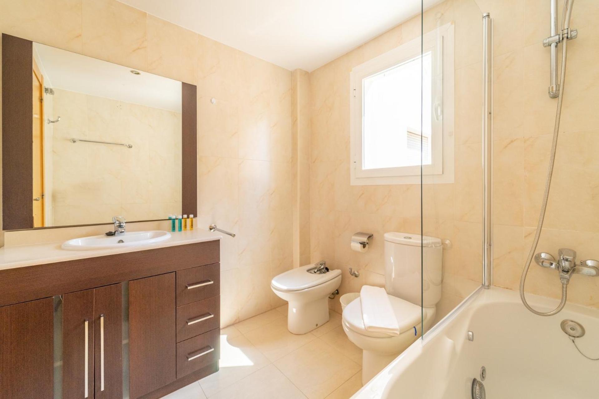 Three-Bedroom Apartment - Photo 18